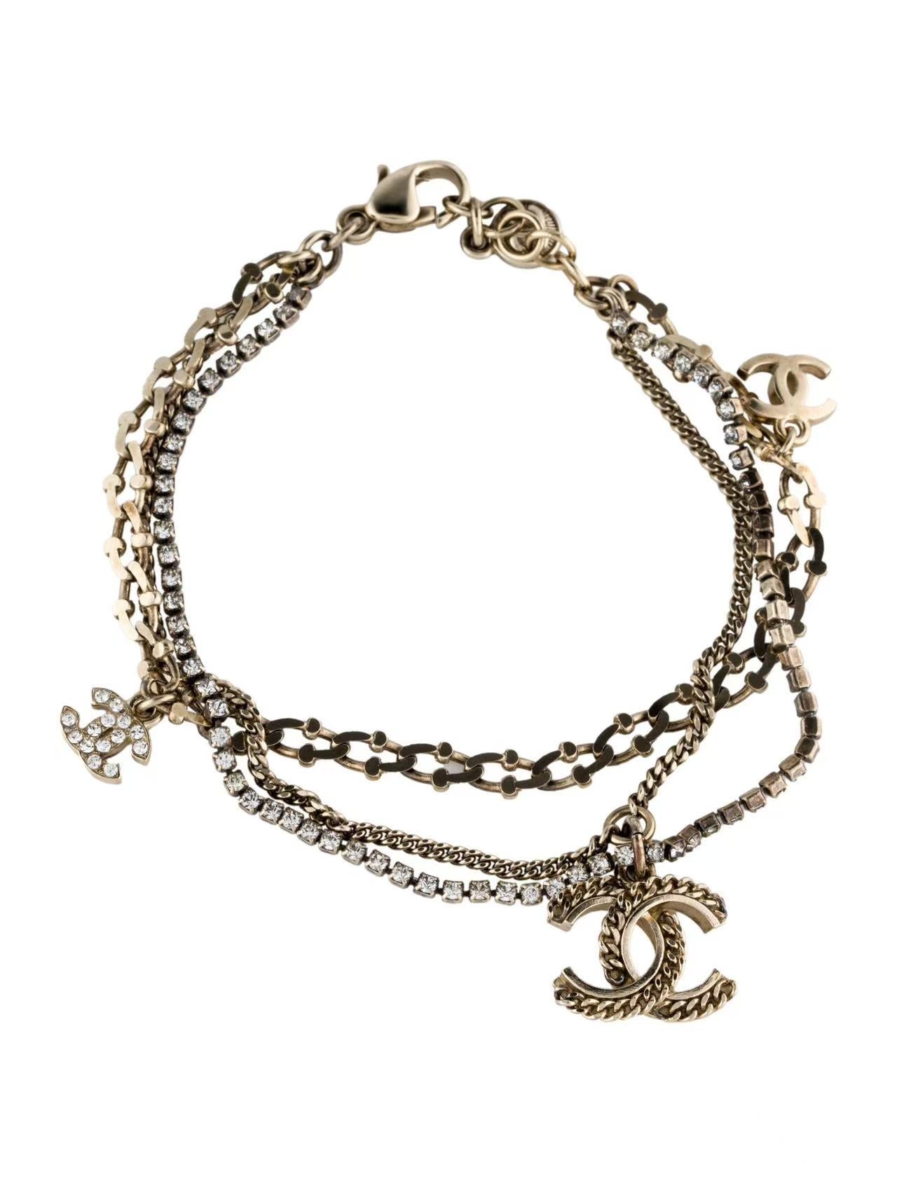 Chanel Goldtone Metal Black Enamel 100 Year Anniversary Charm Bracelet twins LDZ325