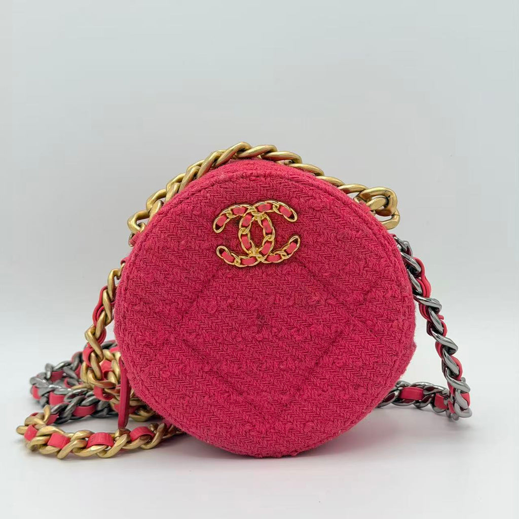 Chanel 19 Round Clutch in pink tweed