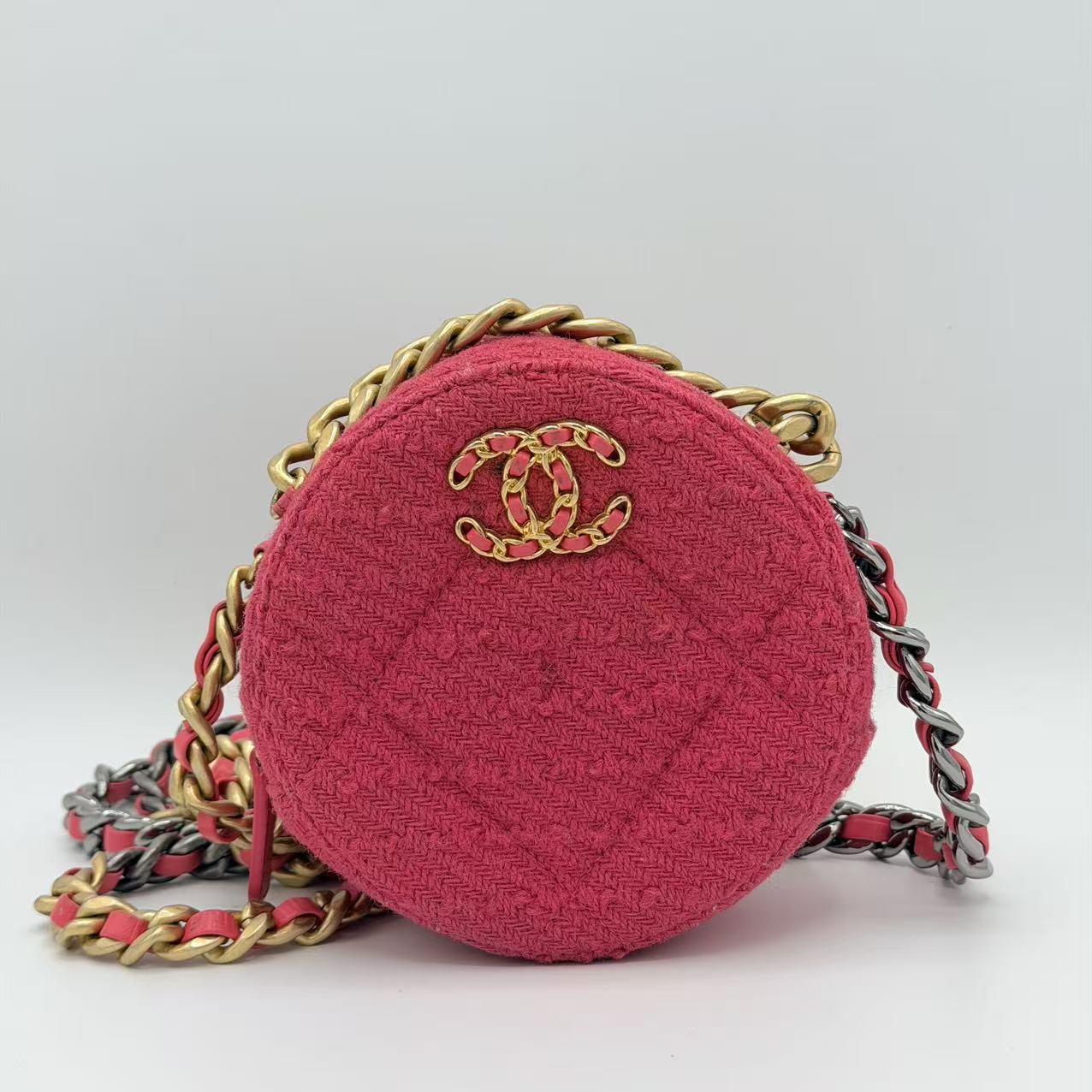 Chanel 19 Round Clutch in pink tweed