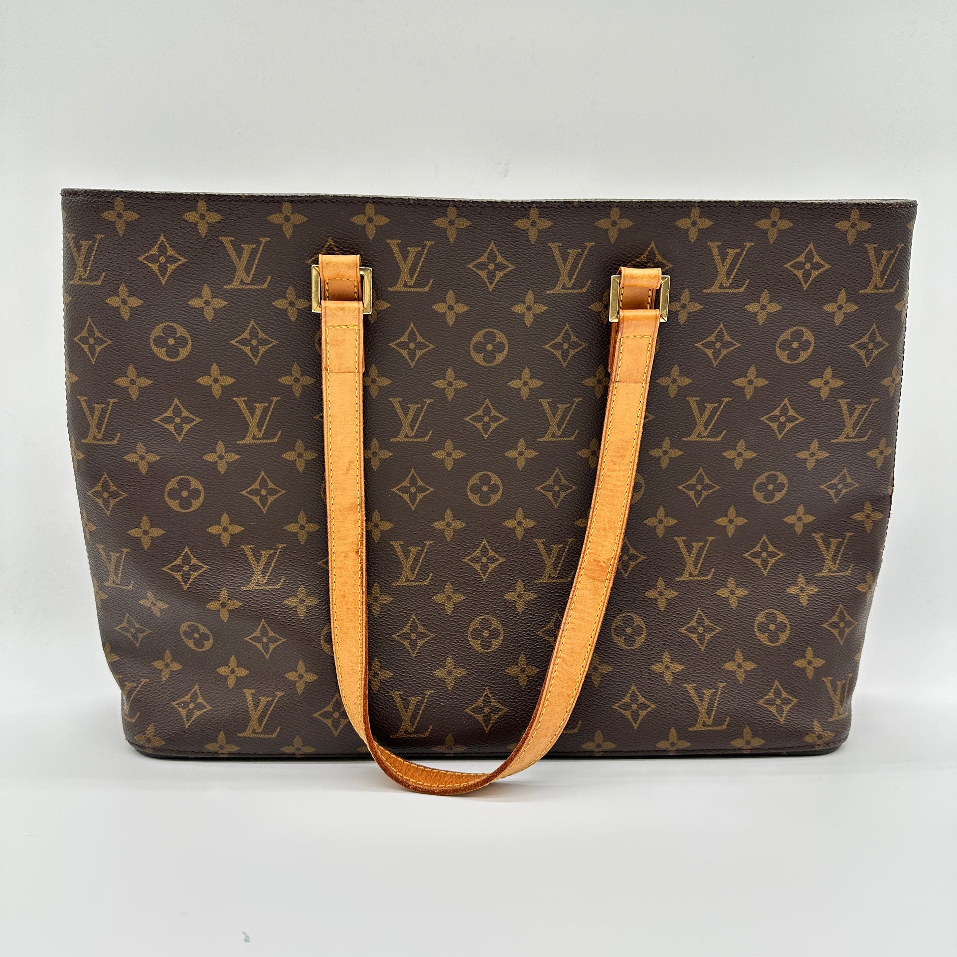 Luco Bag in Monogram Canvas and Tan Leather Trim