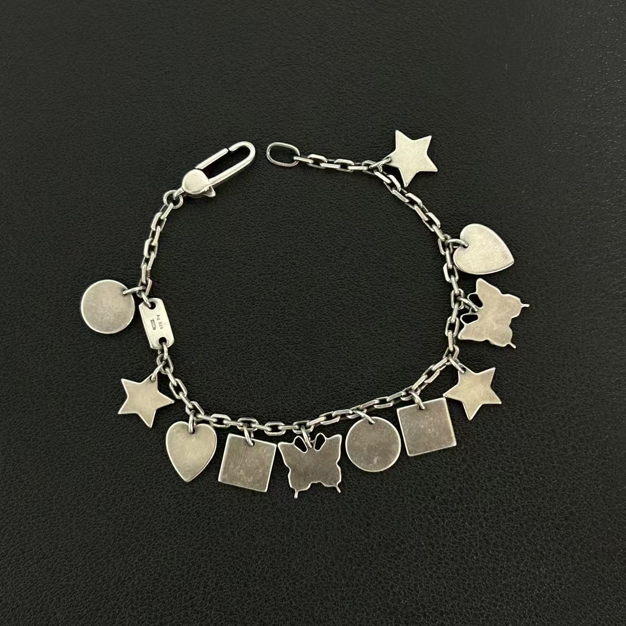 Gucci Sterling Silver Multi-Charm Trademark Bracelet twins LDZ327