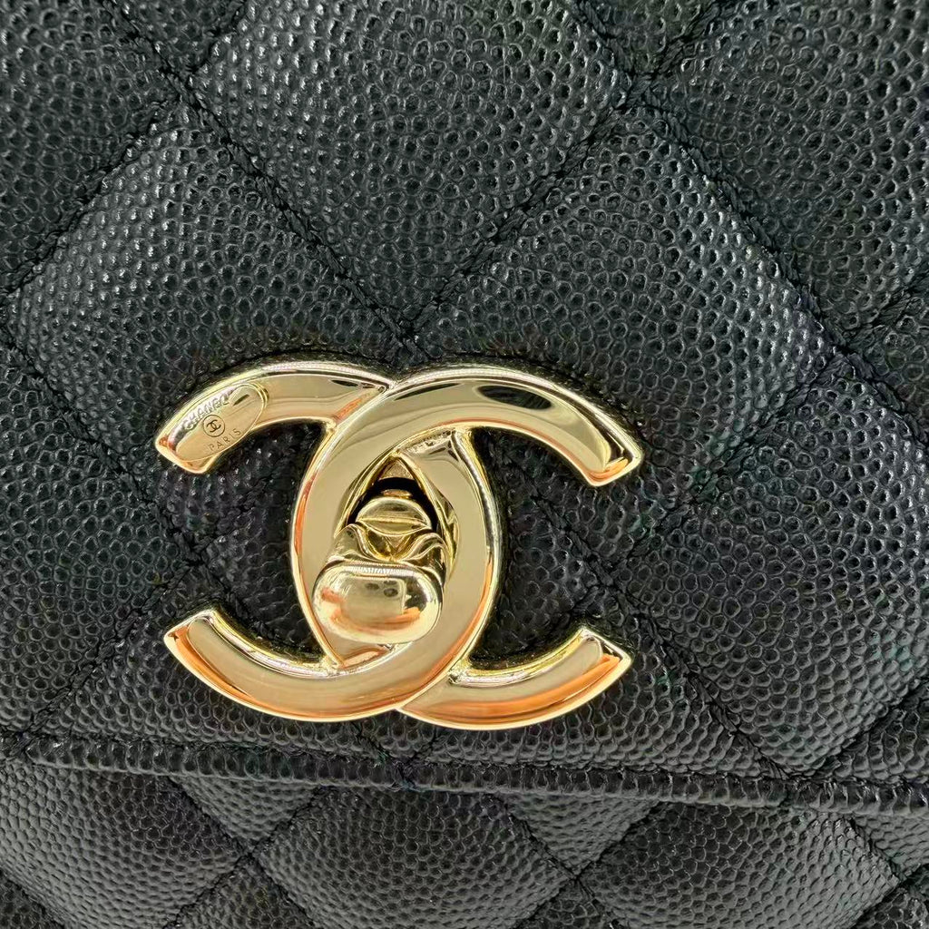 Coco Handle Flap Bag in black caviar leather with gold-tone HW