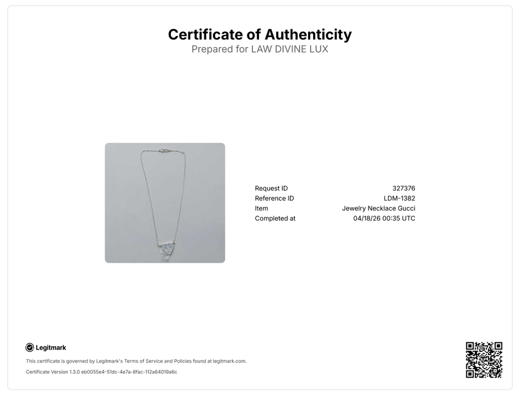 Trademark necklace with heart pendant