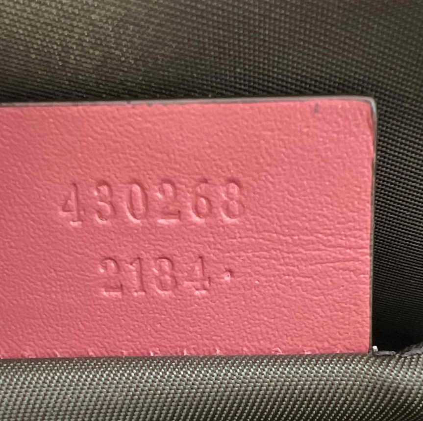 Gucci GG Supreme Clutch W23391