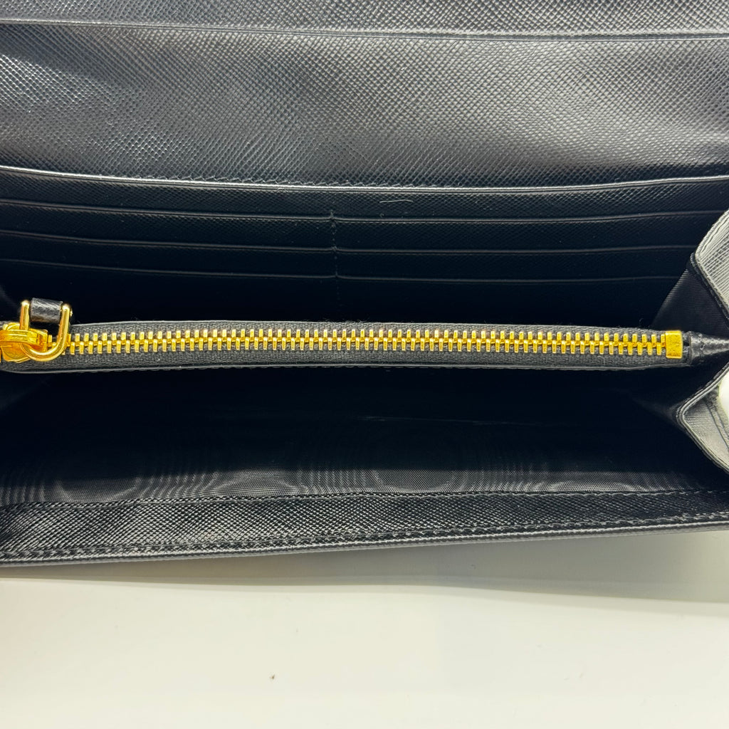 Saffiano Triangle Logo Continental Flap Travel Wallet Black