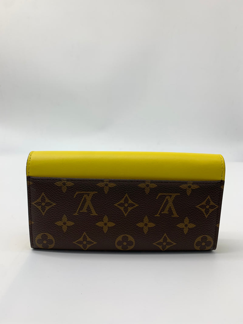 Louis Vuitton Tribal Mask Sarah Wallet Monogram Canvas and Leather