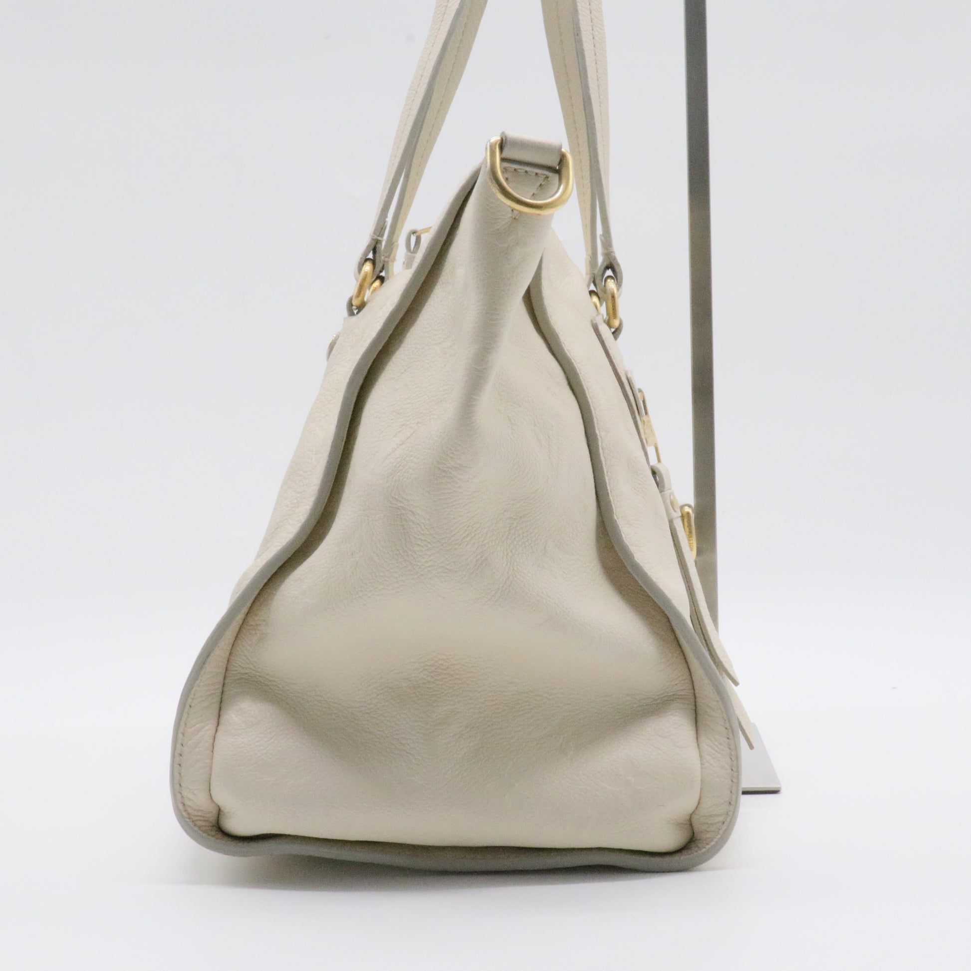 Lumineuse Handbag Monogram Empreinte Leather PM
