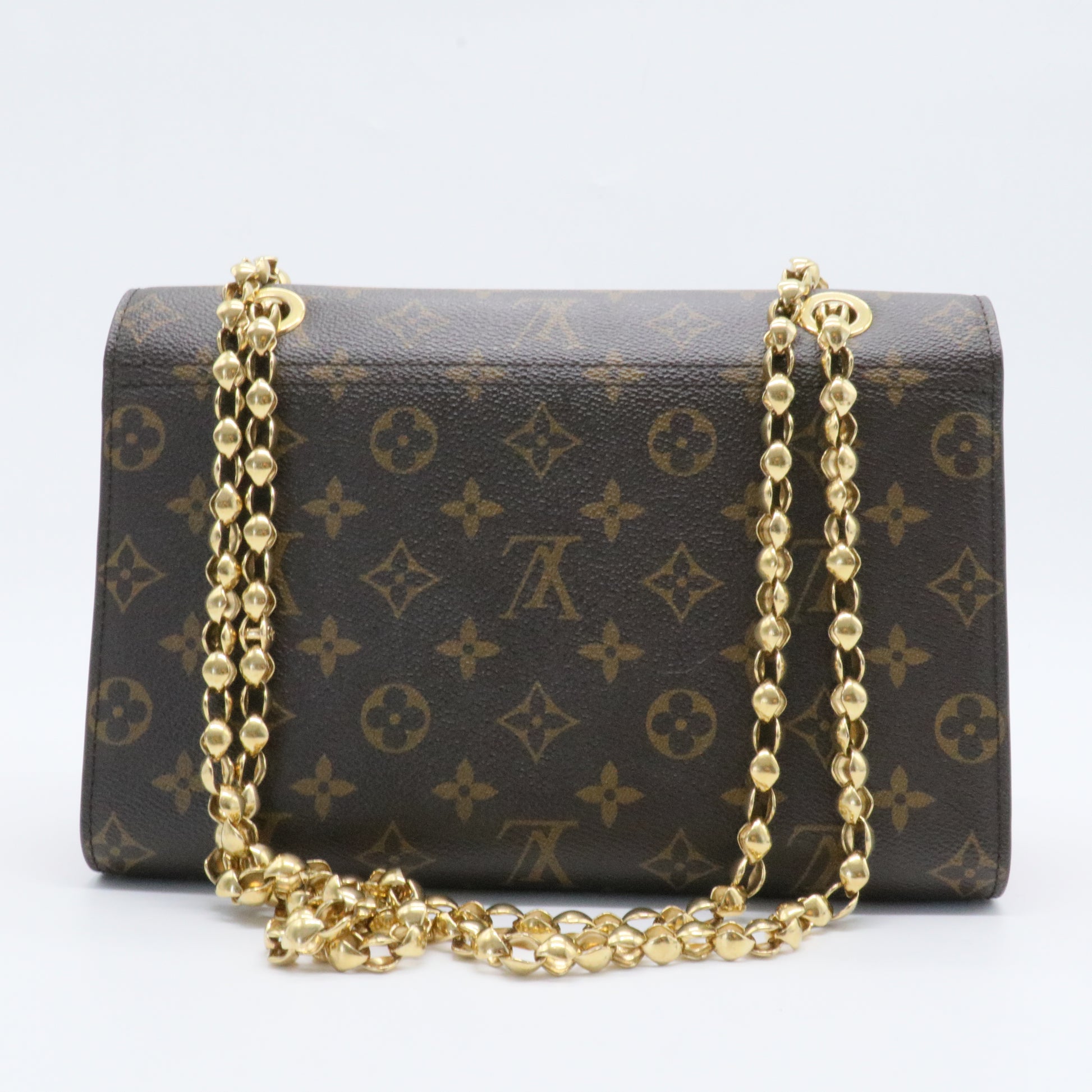 Victoire Handbag Monogram Canvas and Leather
