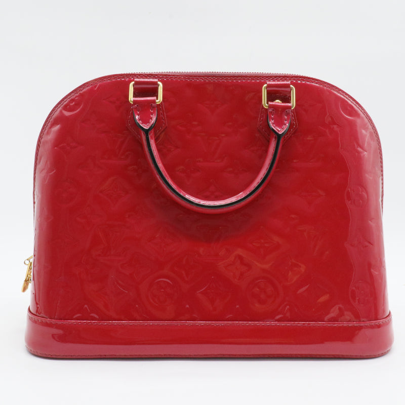 Alma Handbag Monogram Vernis PM