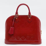 Alma Handbag Monogram Vernis PM