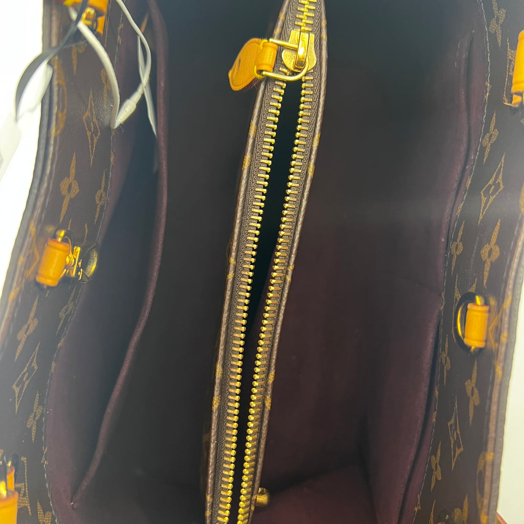 Montaigne Handbag Monogram Canvas MM twins