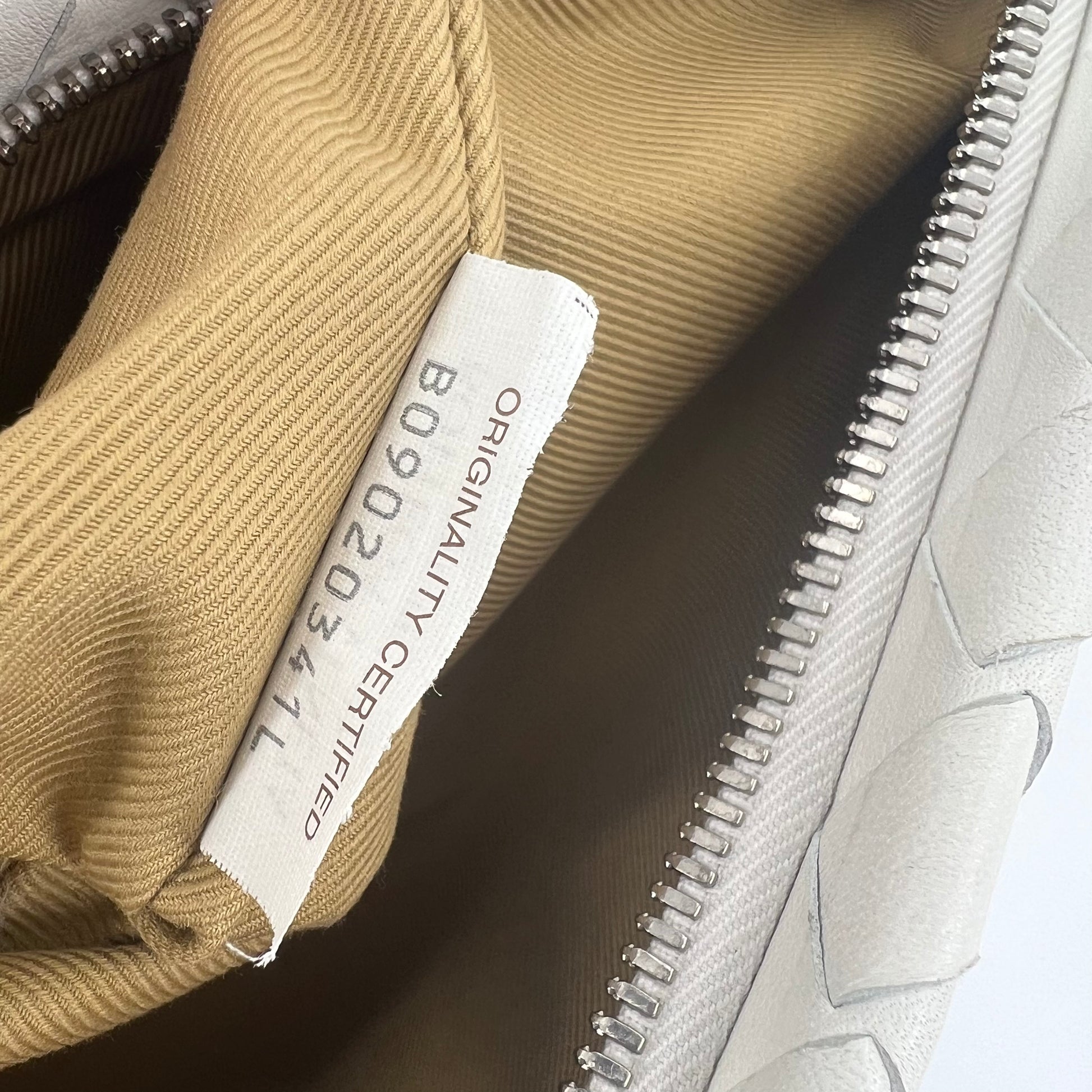 Intrecciato Woven Clutch twins