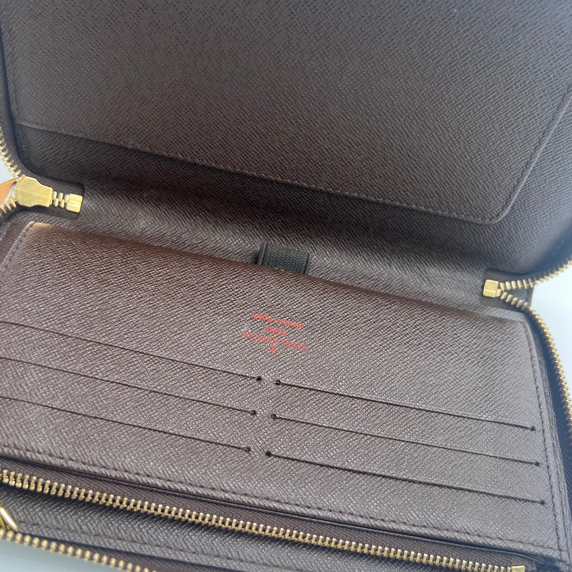 Zippy wallet in Damier Ebene canvas twins