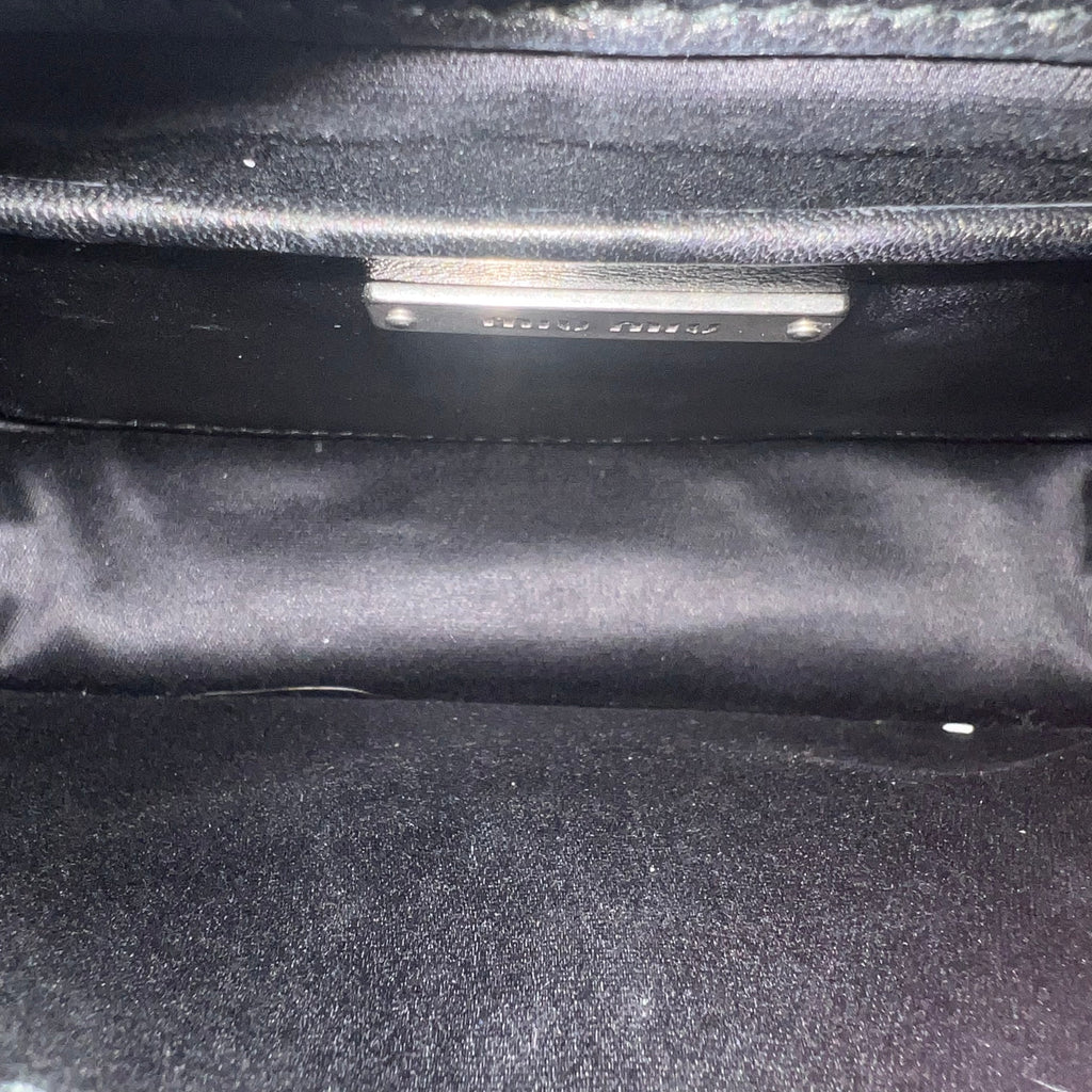 Confidential leather handbag twins