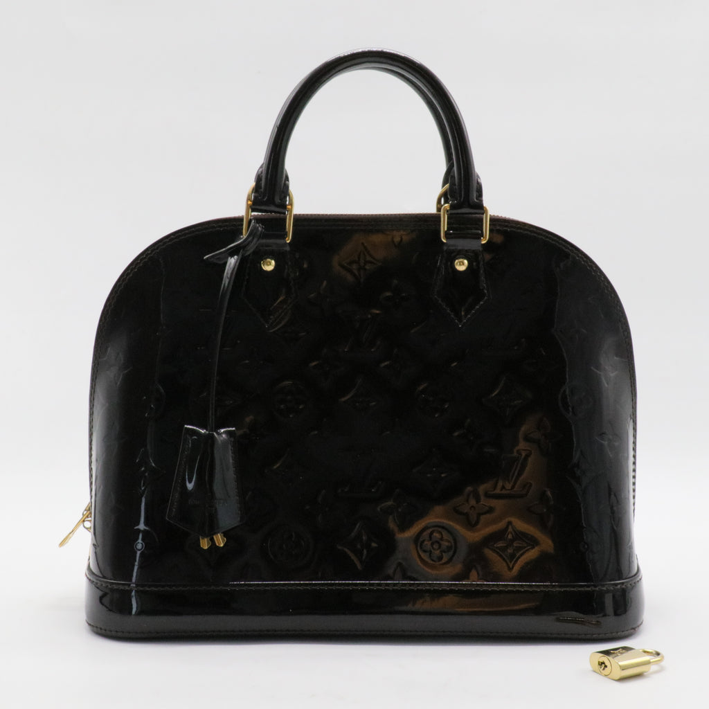 Alma Handbag Monogram Vernis PM