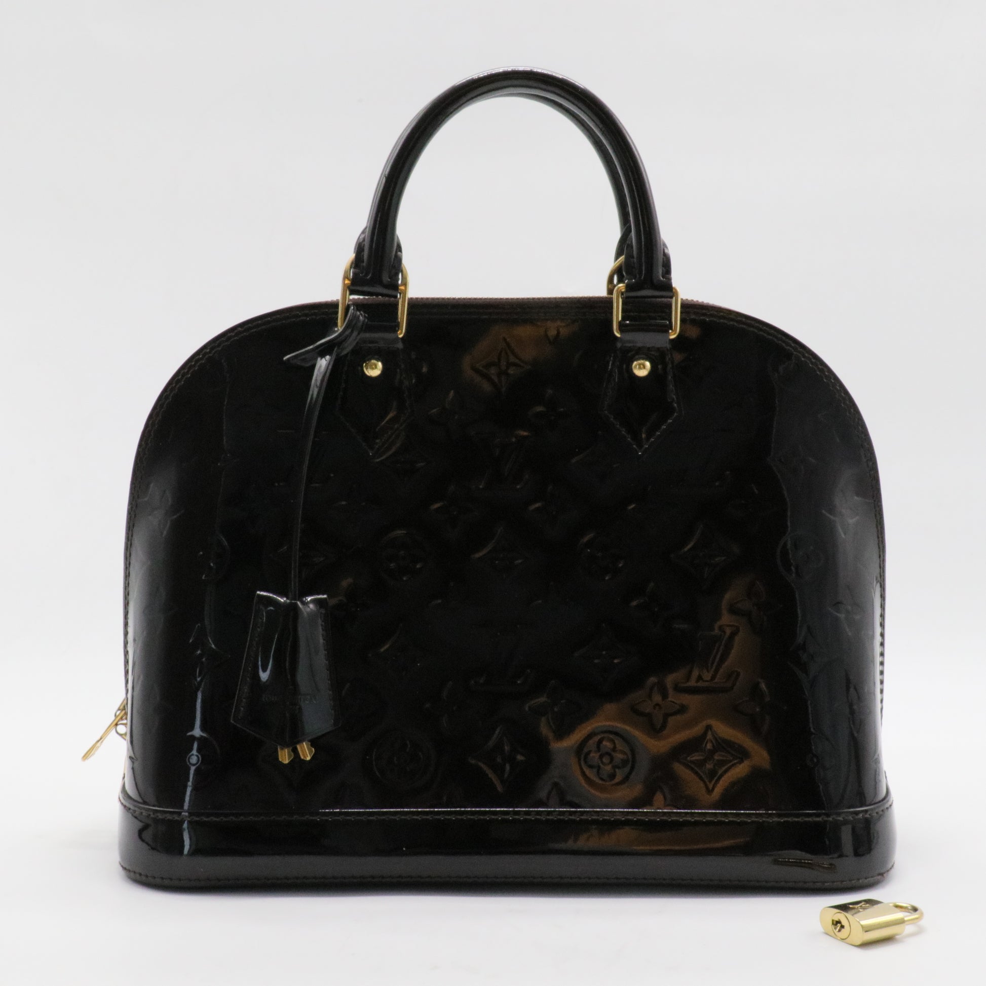 Alma Handbag Monogram Vernis PM