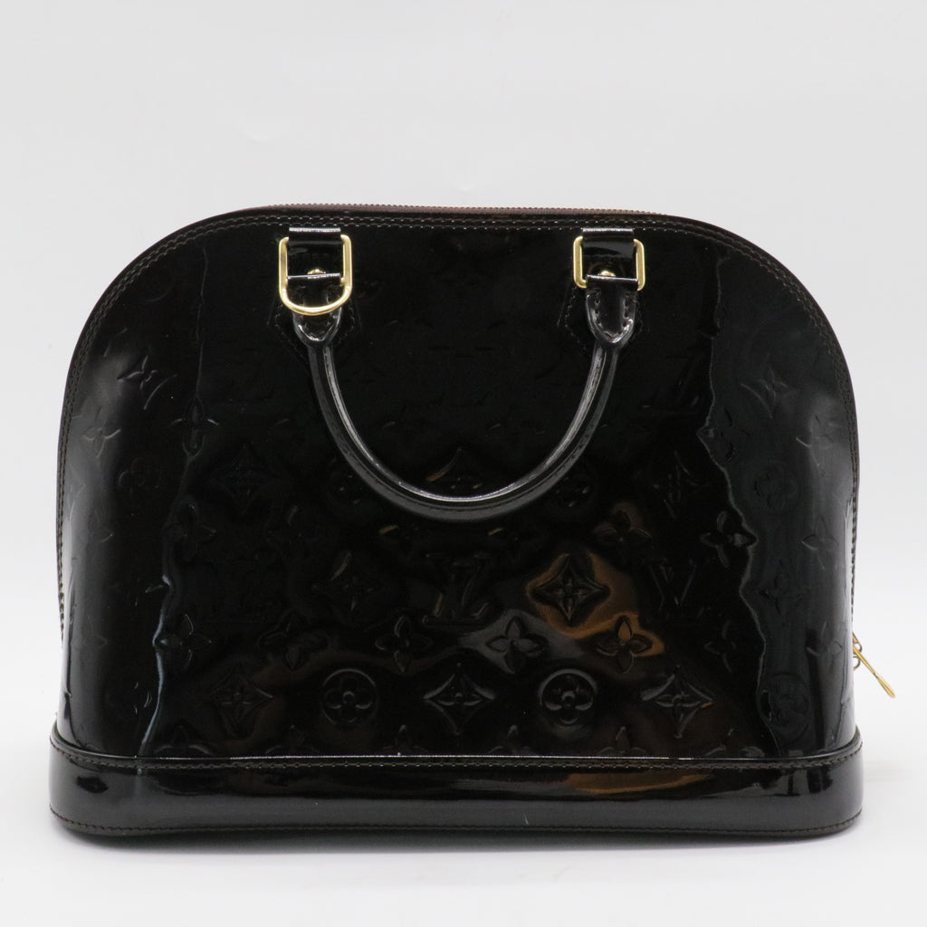 Alma Handbag Monogram Vernis PM