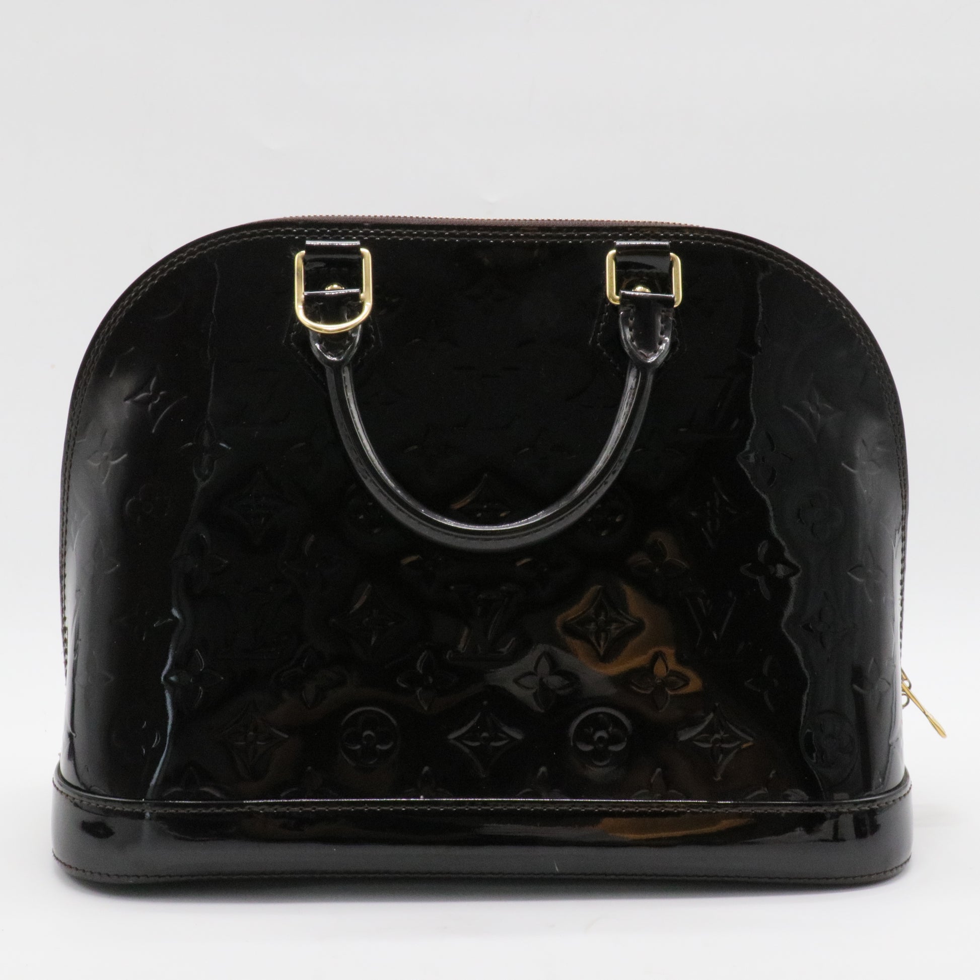 Alma Handbag Monogram Vernis PM
