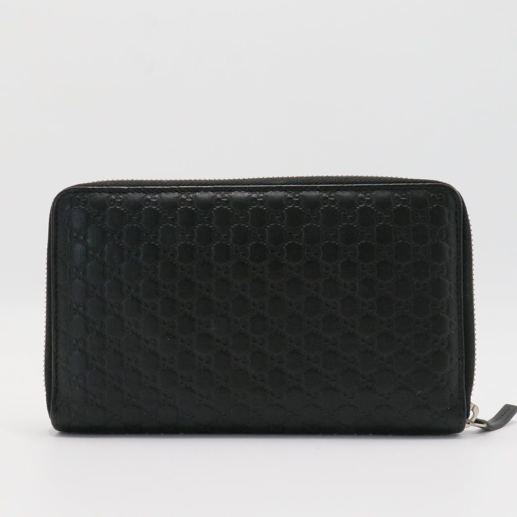 GG Logo Embossed Leather Zipper Long Wallet