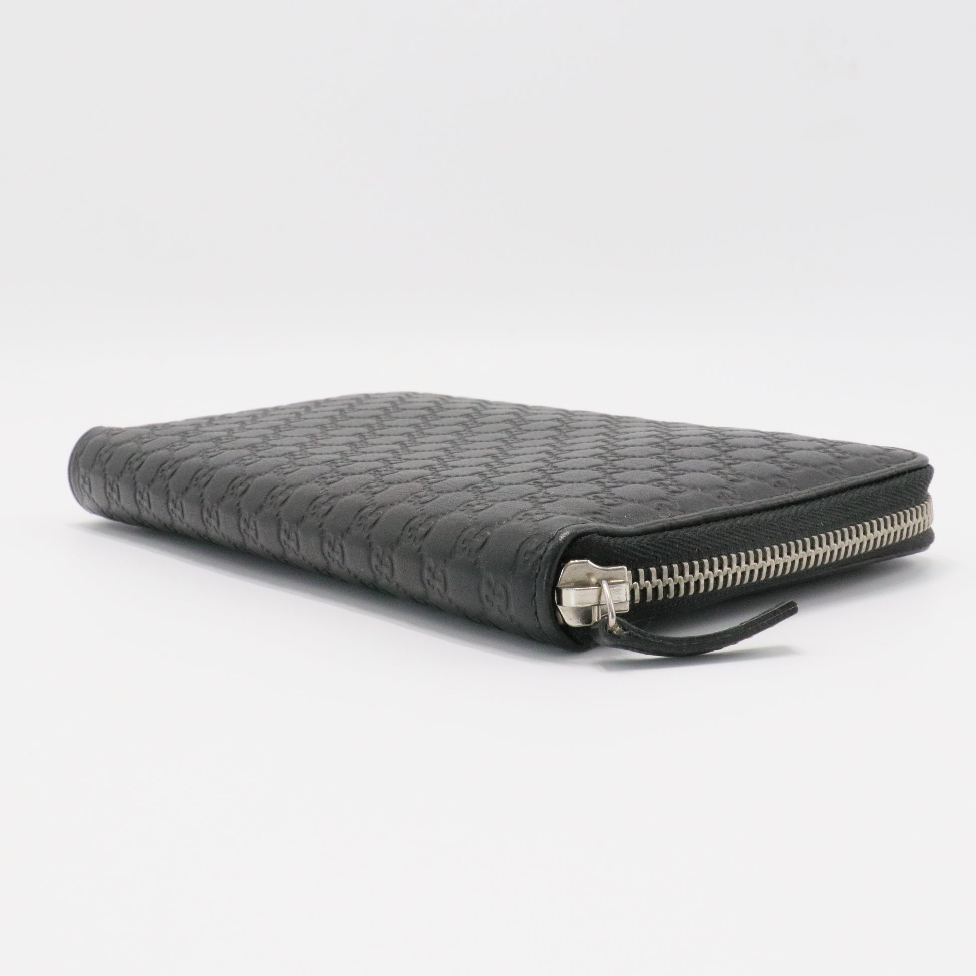 GG Logo Embossed Leather Zipper Long Wallet