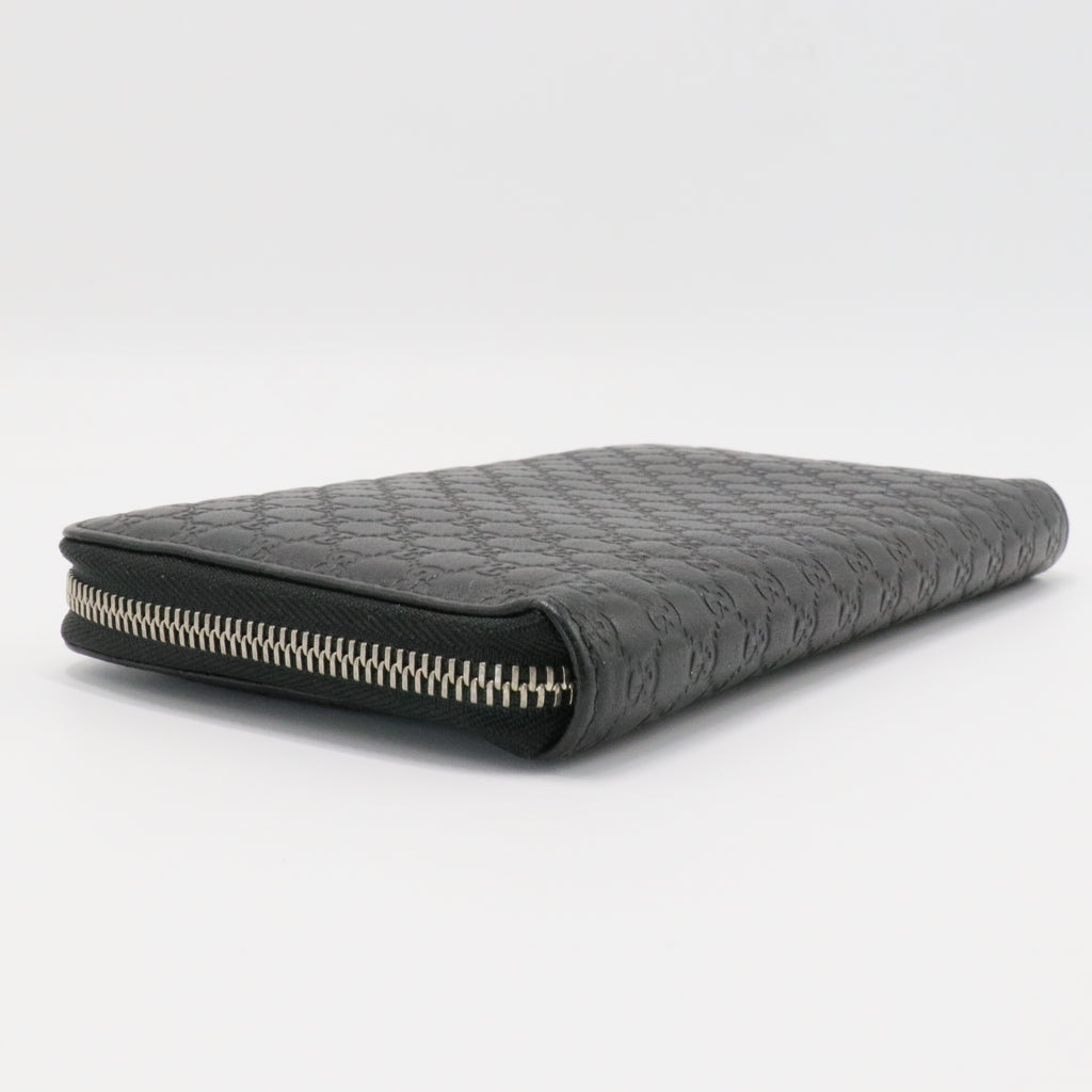 GG Logo Embossed Leather Zipper Long Wallet