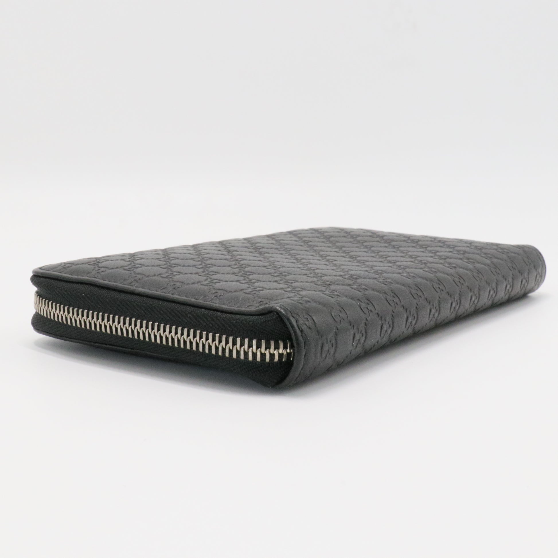 GG Logo Embossed Leather Zipper Long Wallet