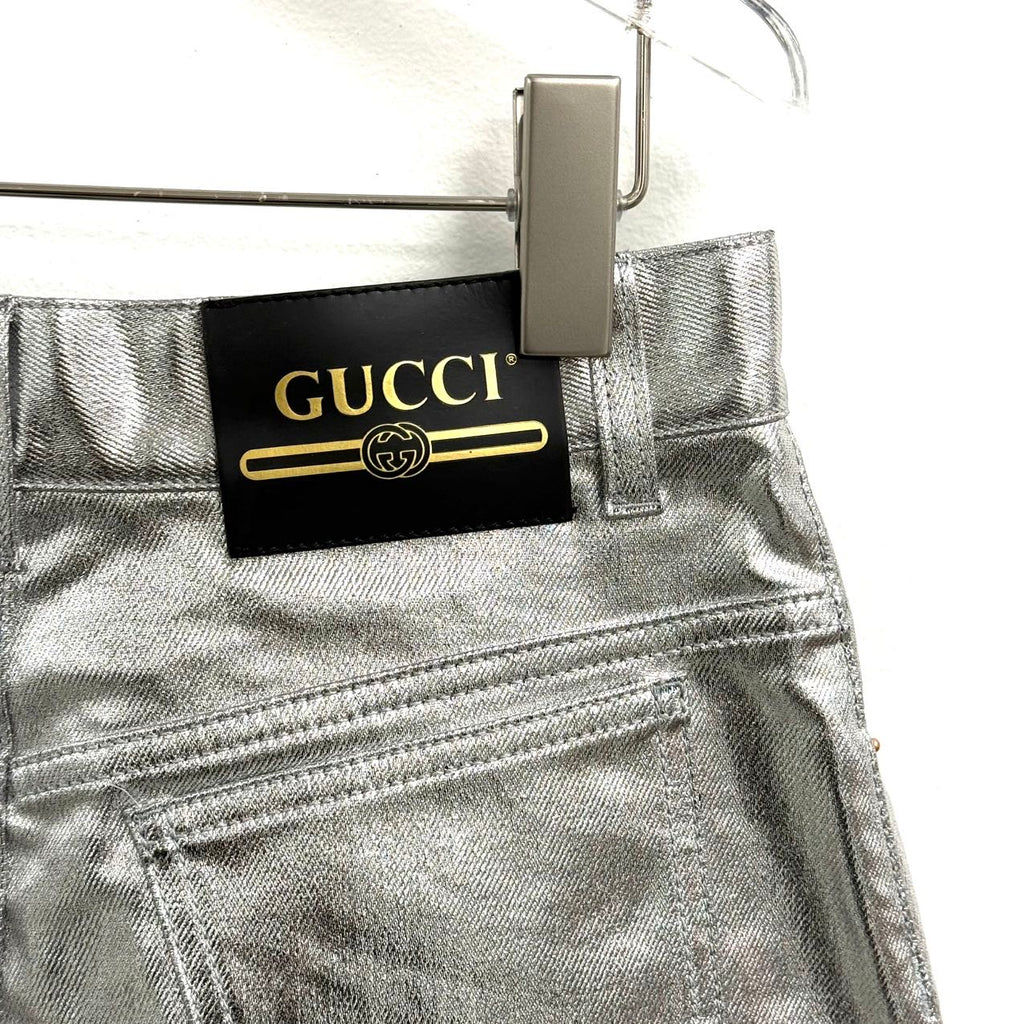 Gucci metallic silver leather midi skirt.