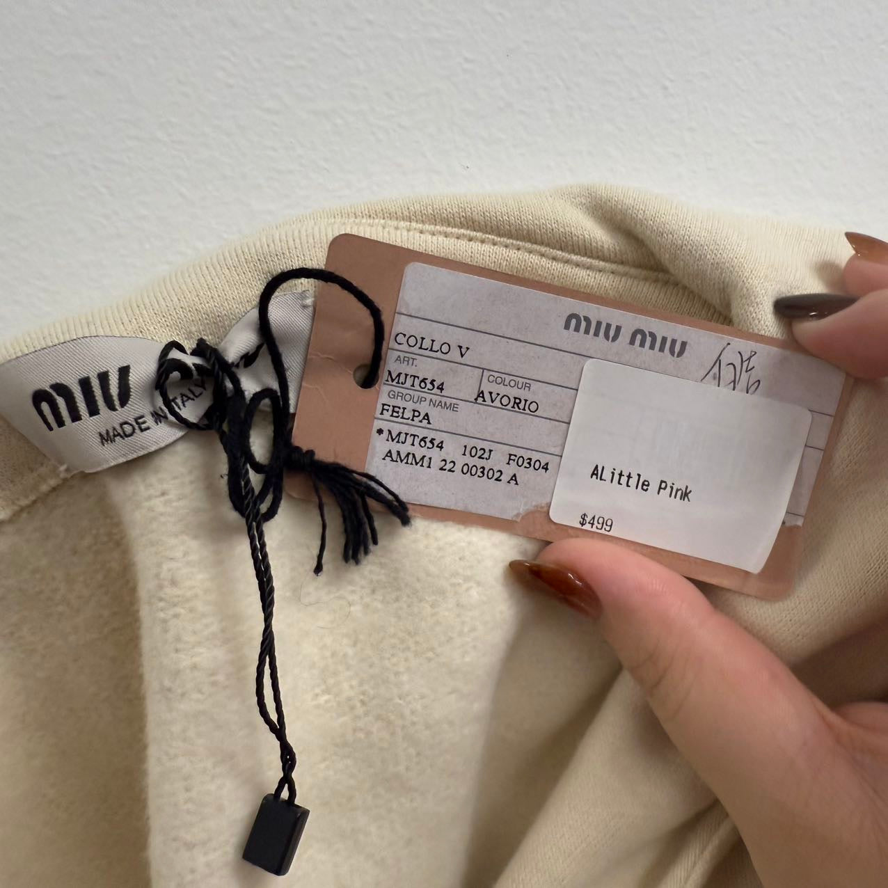 Miu Miu Spring 2022 cream logo sleeveless hoodie. L