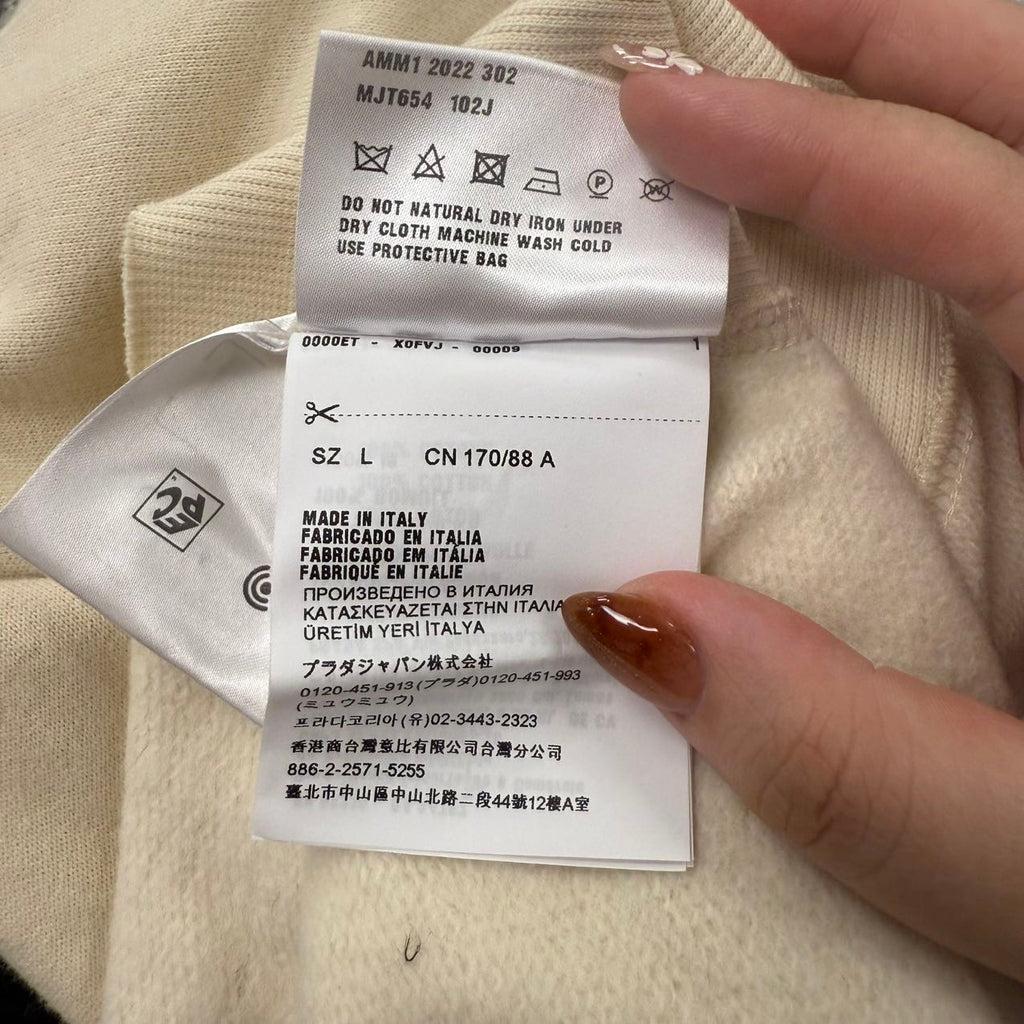 Miu Miu Spring 2022 cream logo sleeveless hoodie. L