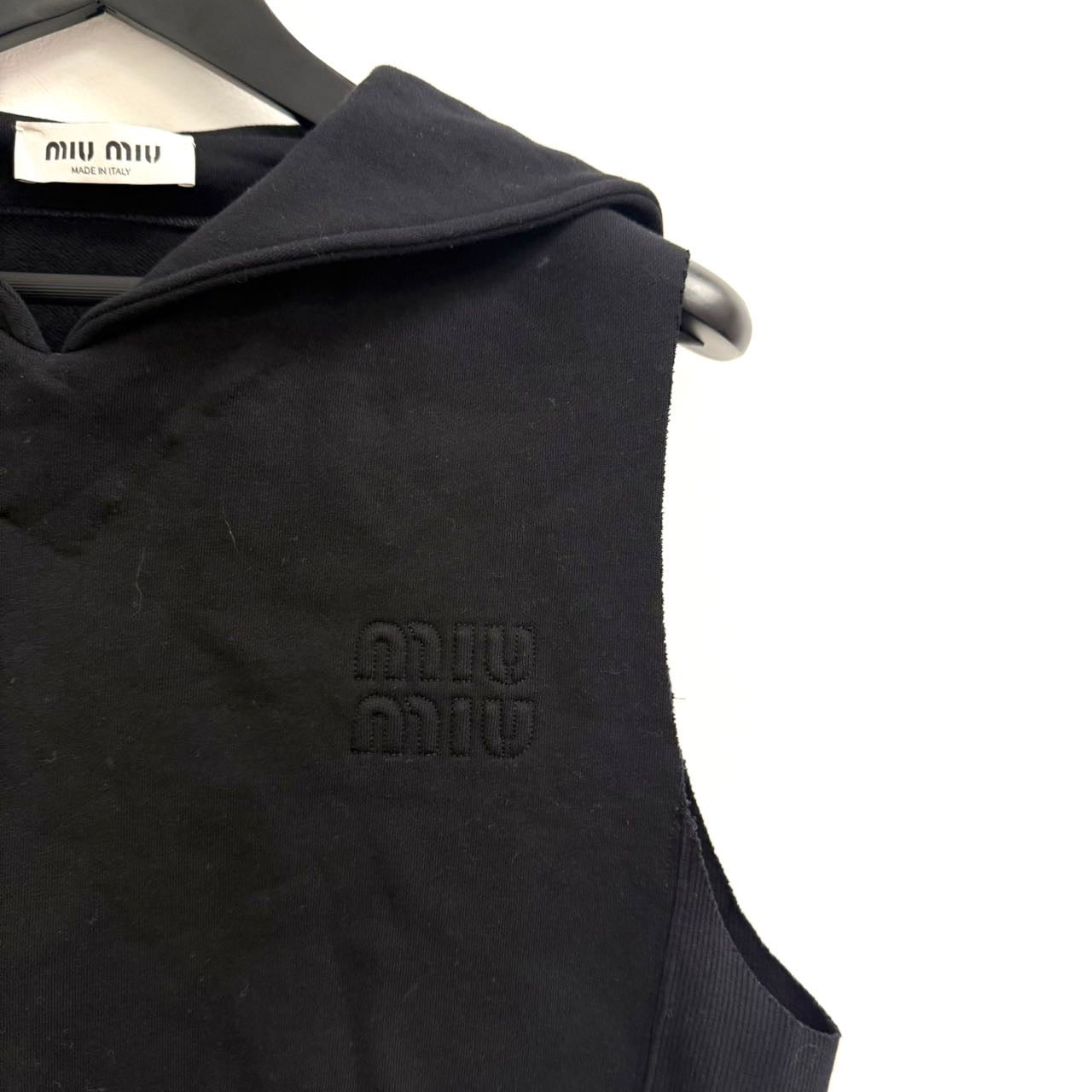 black Miu Miu sleeveless cotton sweatshirt with a sailor collar and embroidered logo.