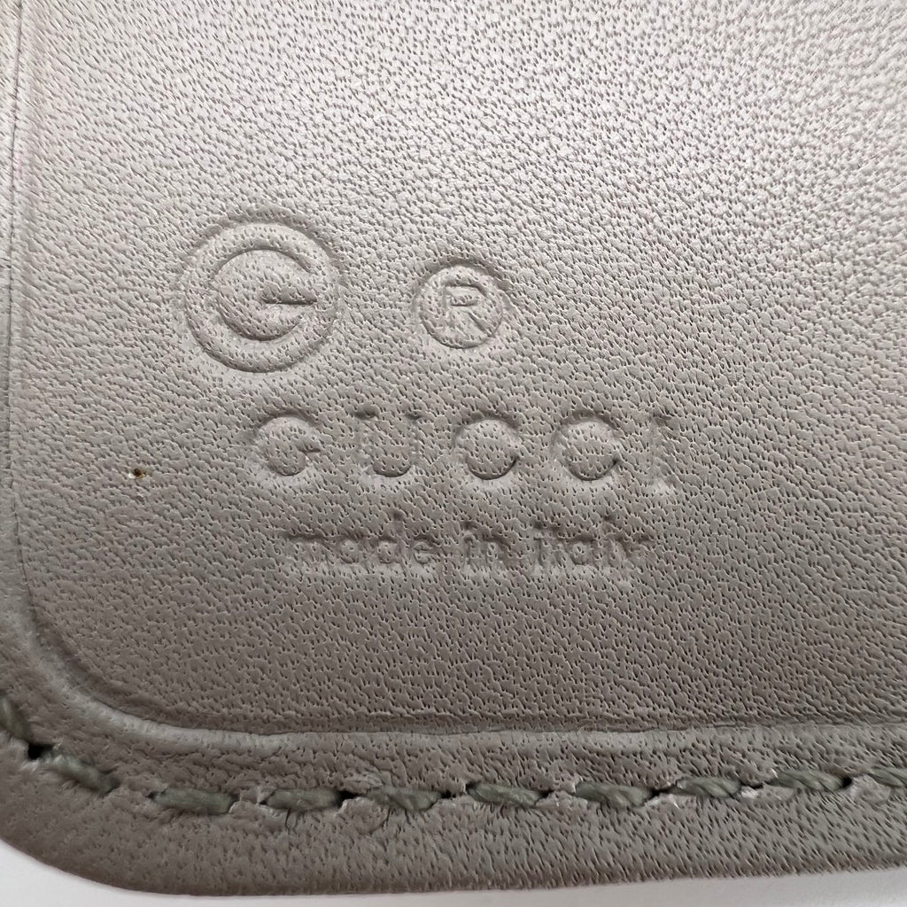 Gucci Embossed Logo Leather Flap Long Wallet W21640