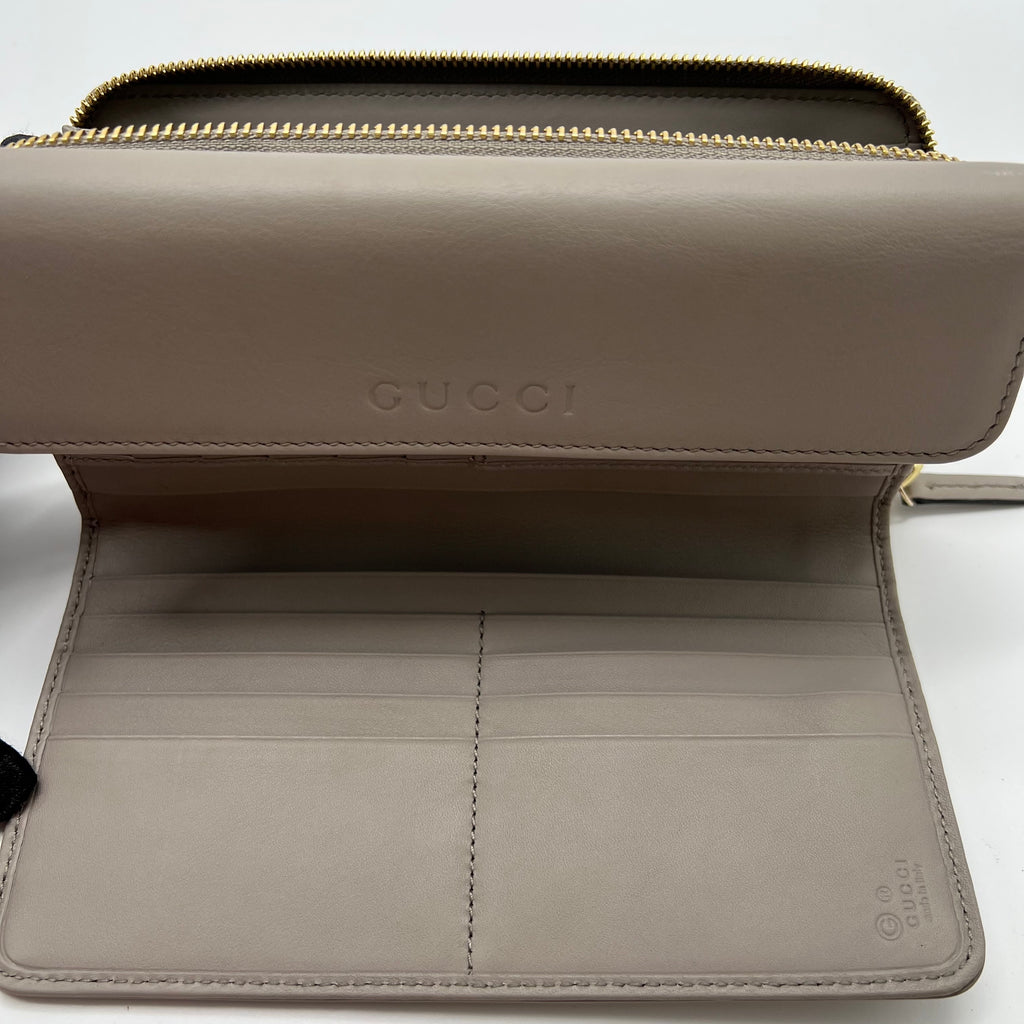 Gucci Embossed Logo Leather Flap Long Wallet W21640