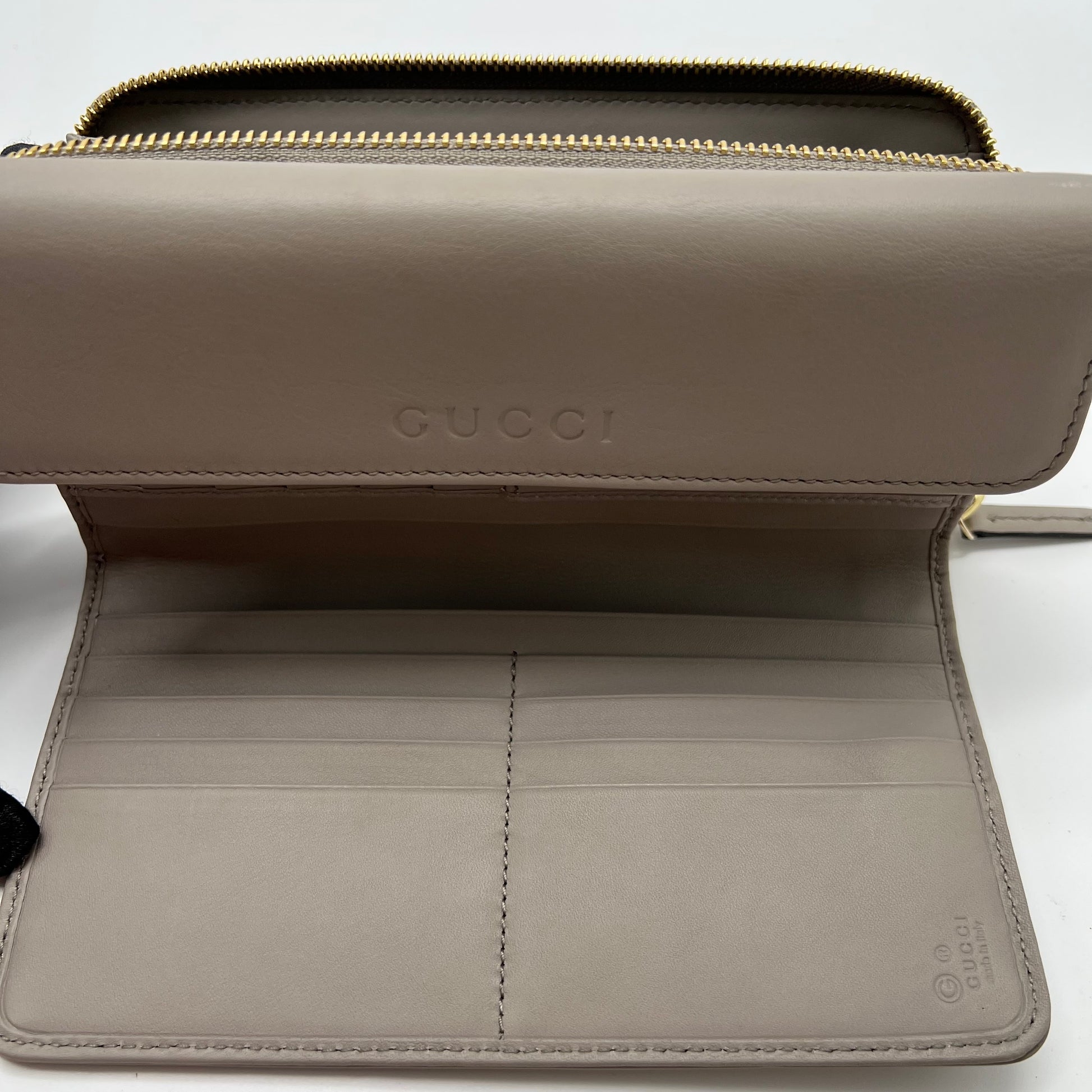 Gucci Embossed Logo Leather Flap Long Wallet W21640