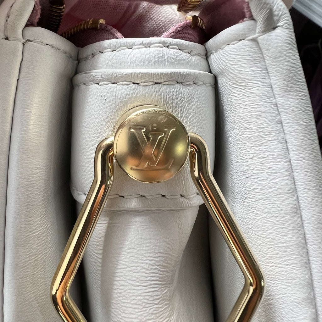 LV COUSSIN WHITE