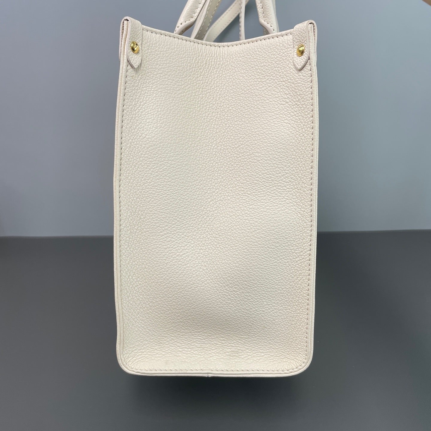 Louis Vuitton OnTheGo MM Tote Bag (Spring 2023 Strawberry Milk Monogram Empreinte) LDZ0015