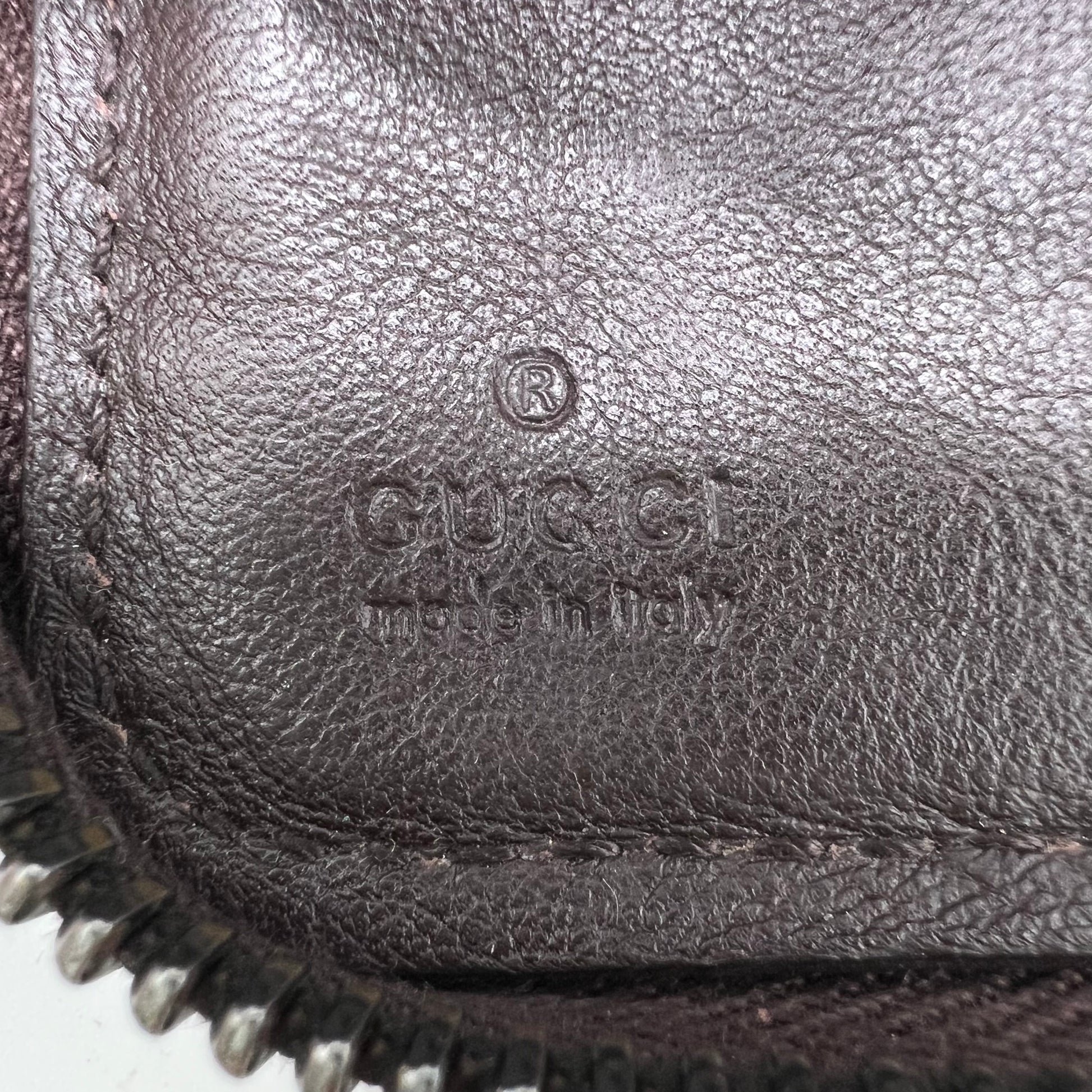 Gucci Guccissima Zip Around Wallet W21829