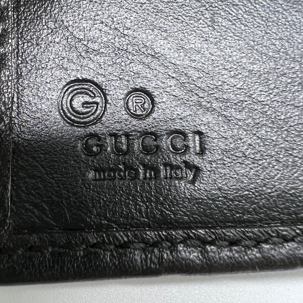 Gucci Signature Leather Bi-Fold Wallet W22104