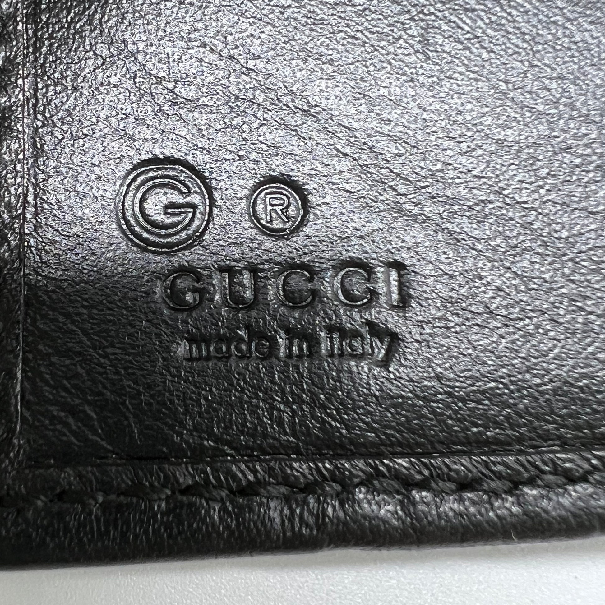 Gucci Signature Leather Bi-Fold Wallet W22104