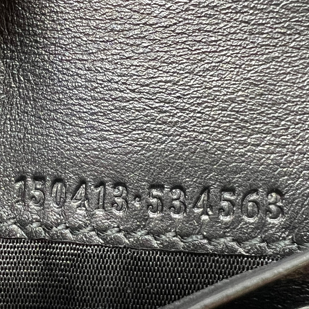 Gucci Signature Leather Bi-Fold Wallet W22104