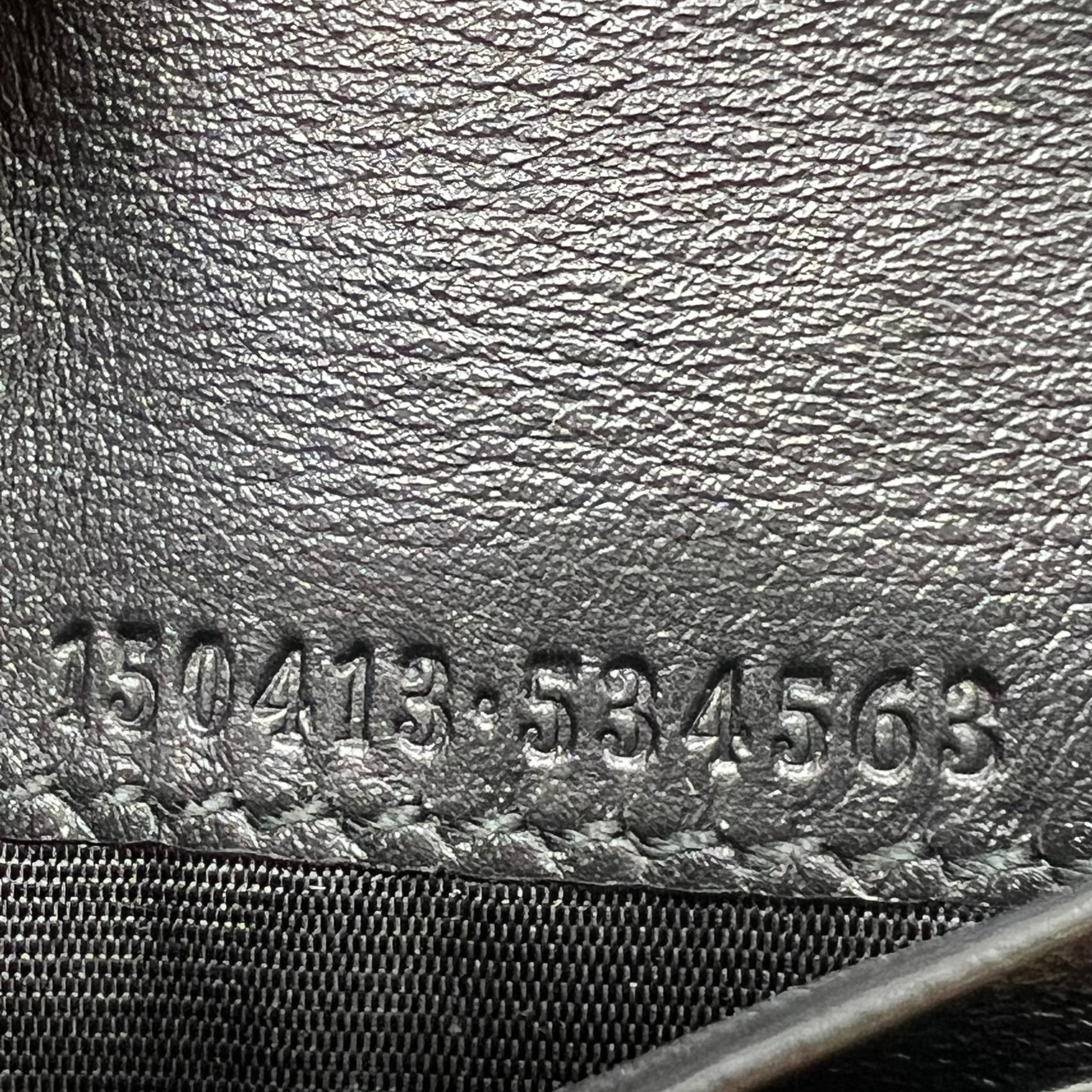 Gucci Signature Leather Bi-Fold Wallet W22104