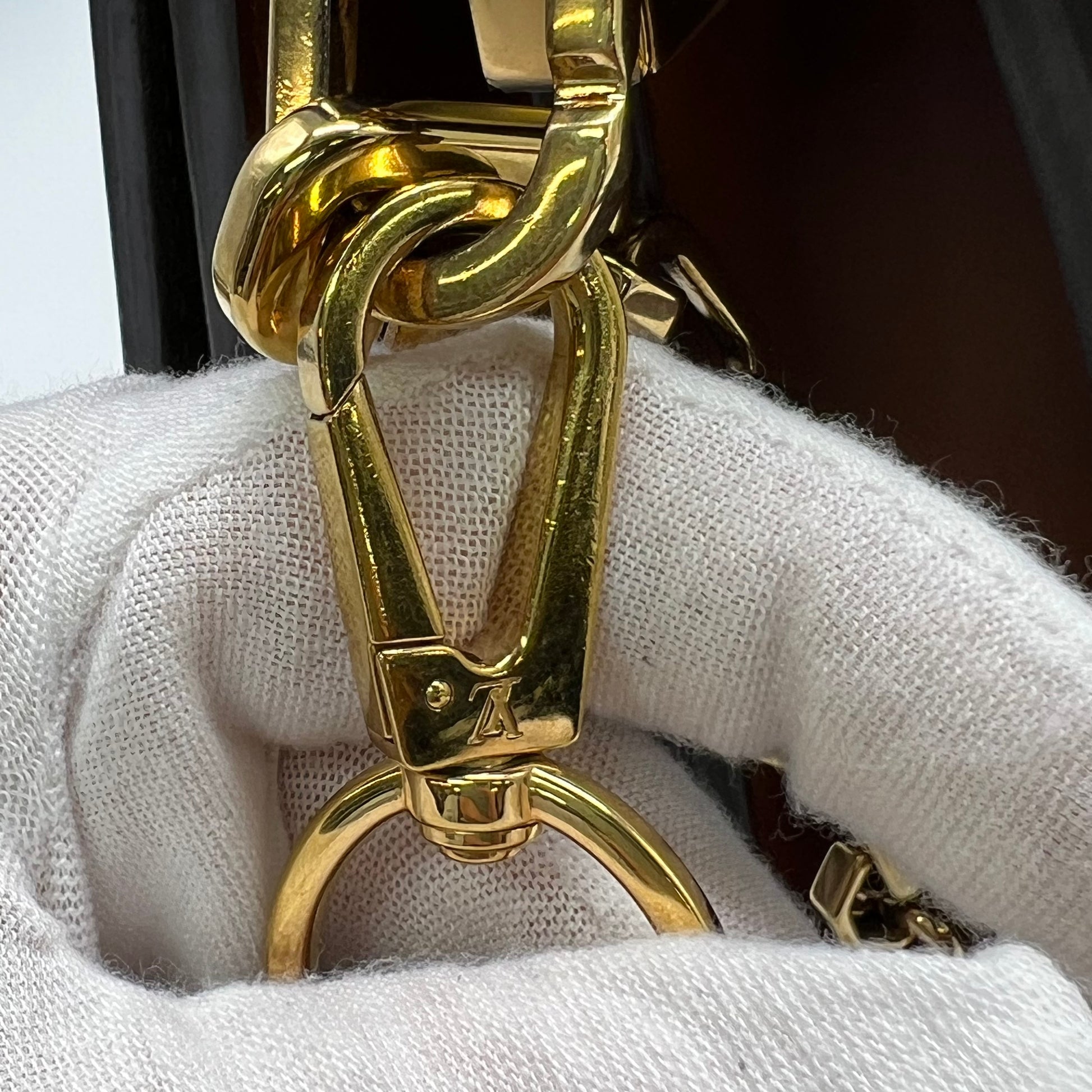 Louis Vuitton LV Garden Dauphine MM bag features a striking metallic blue monogram canvas with a floral print and natural leather trim