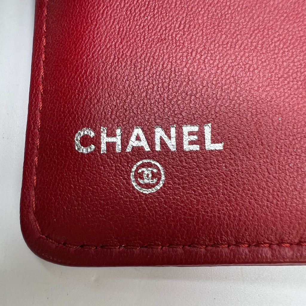 Chanel Camellia Embossed Lambskin French Wallet W22356