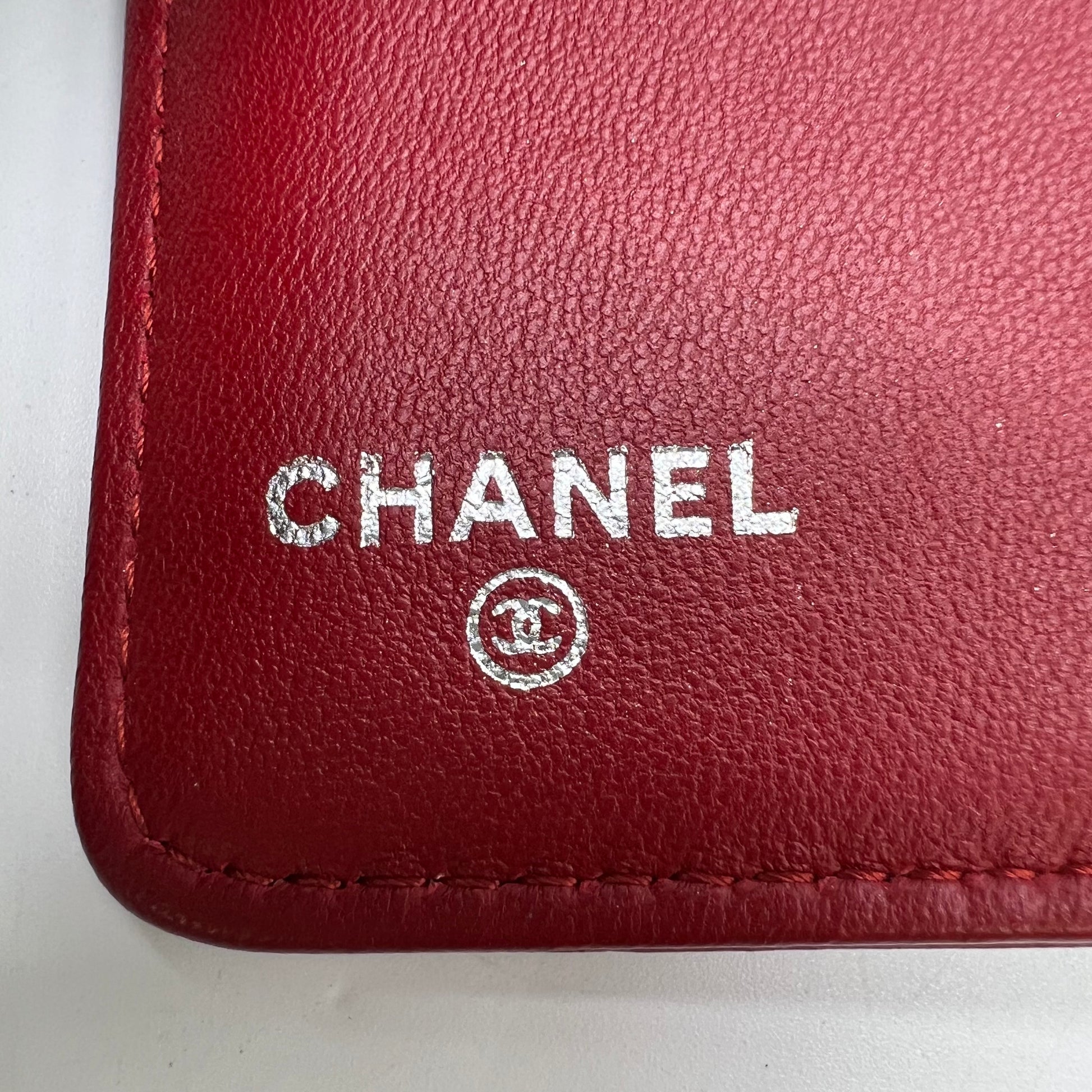 Chanel Camellia Embossed Lambskin French Wallet W22356