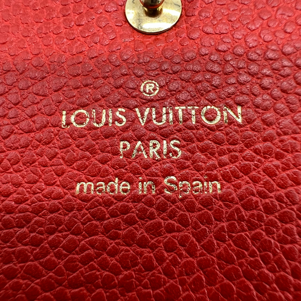 Louis Vuitton Orient Monogram Empreinte Leather Curieuse Wallet W22386