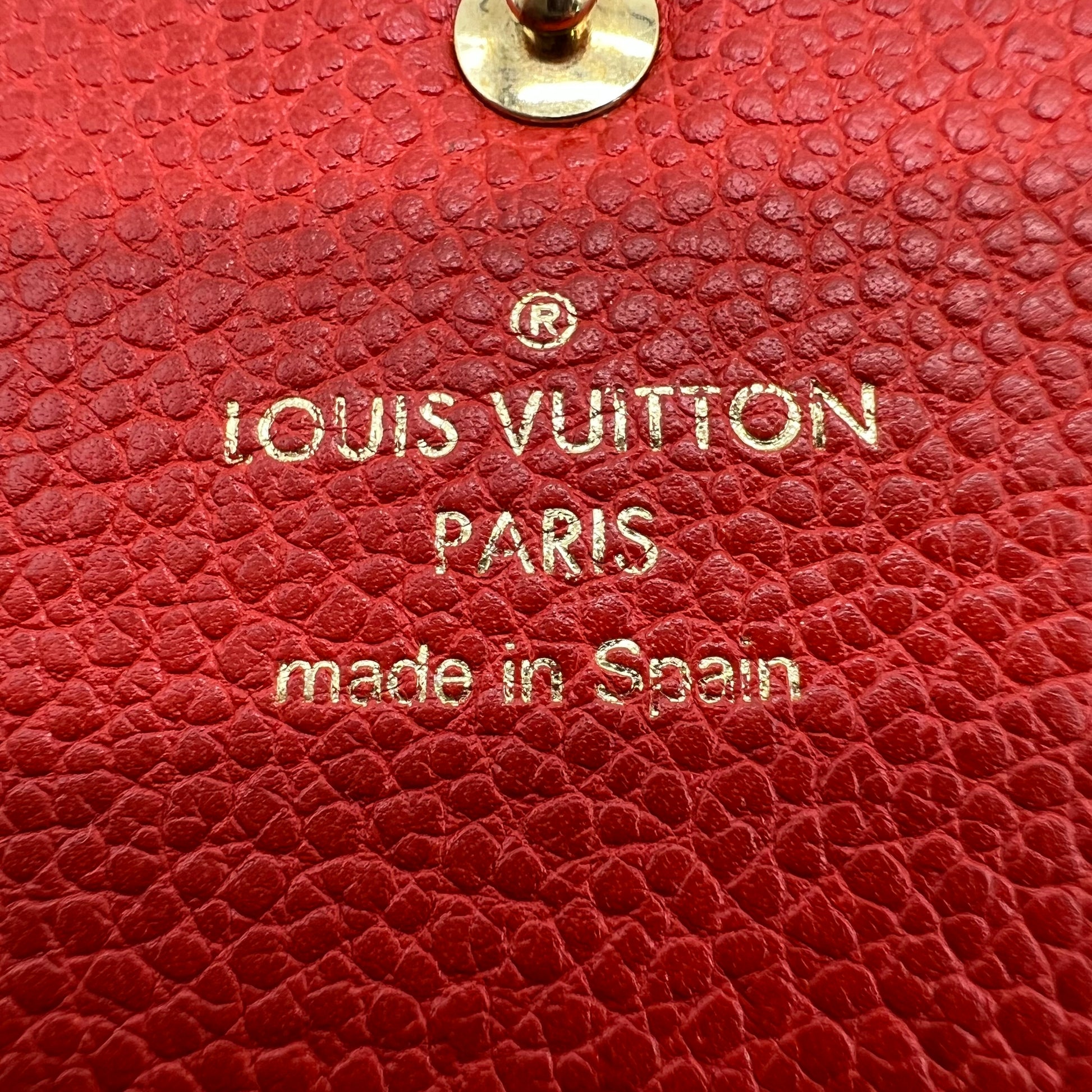 Louis Vuitton Orient Monogram Empreinte Leather Curieuse Wallet W22386