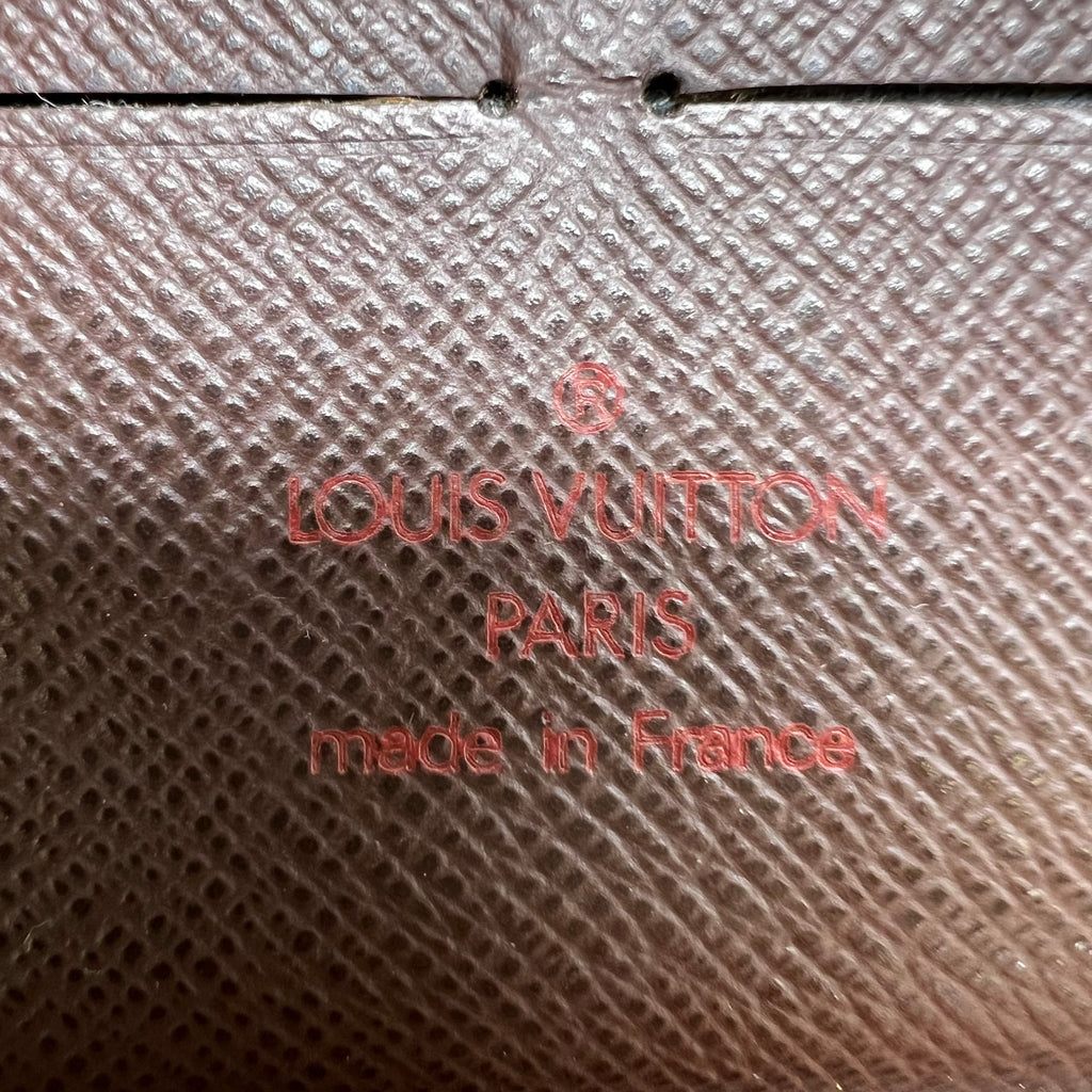 Louis Vuitton Zippy Wallet in Damier Ebene canvas W22387