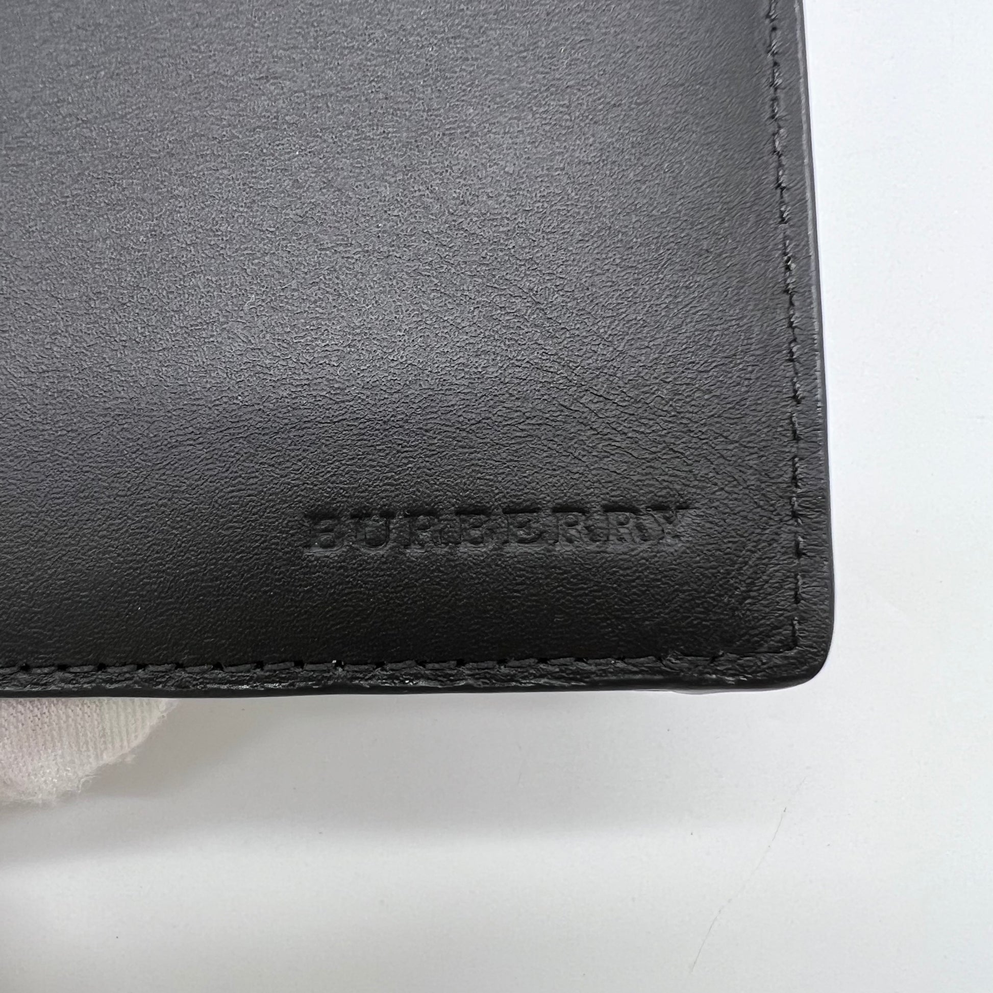 Long leather wallet in black oblique check pattern W22490