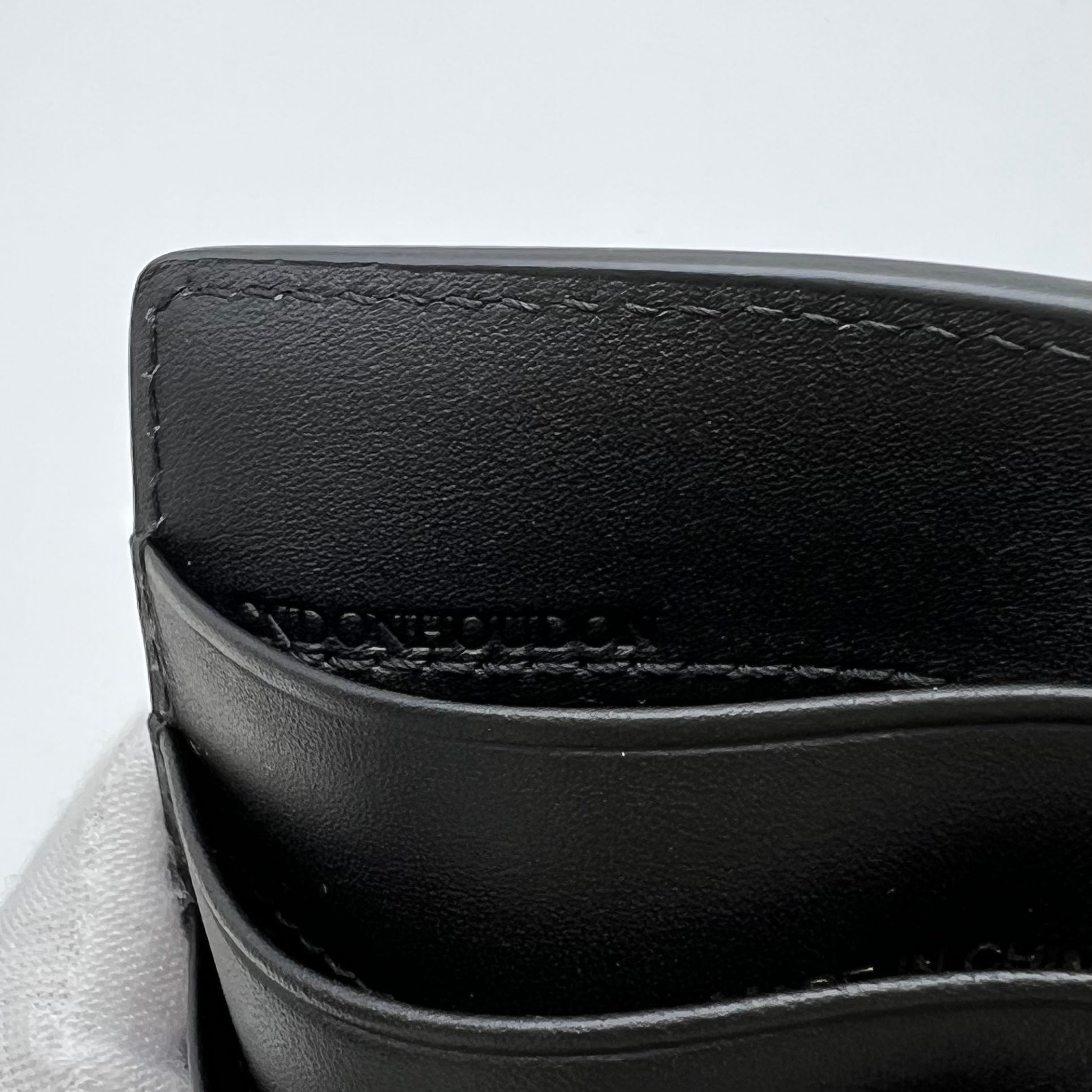 Long leather wallet in black oblique check pattern W22490