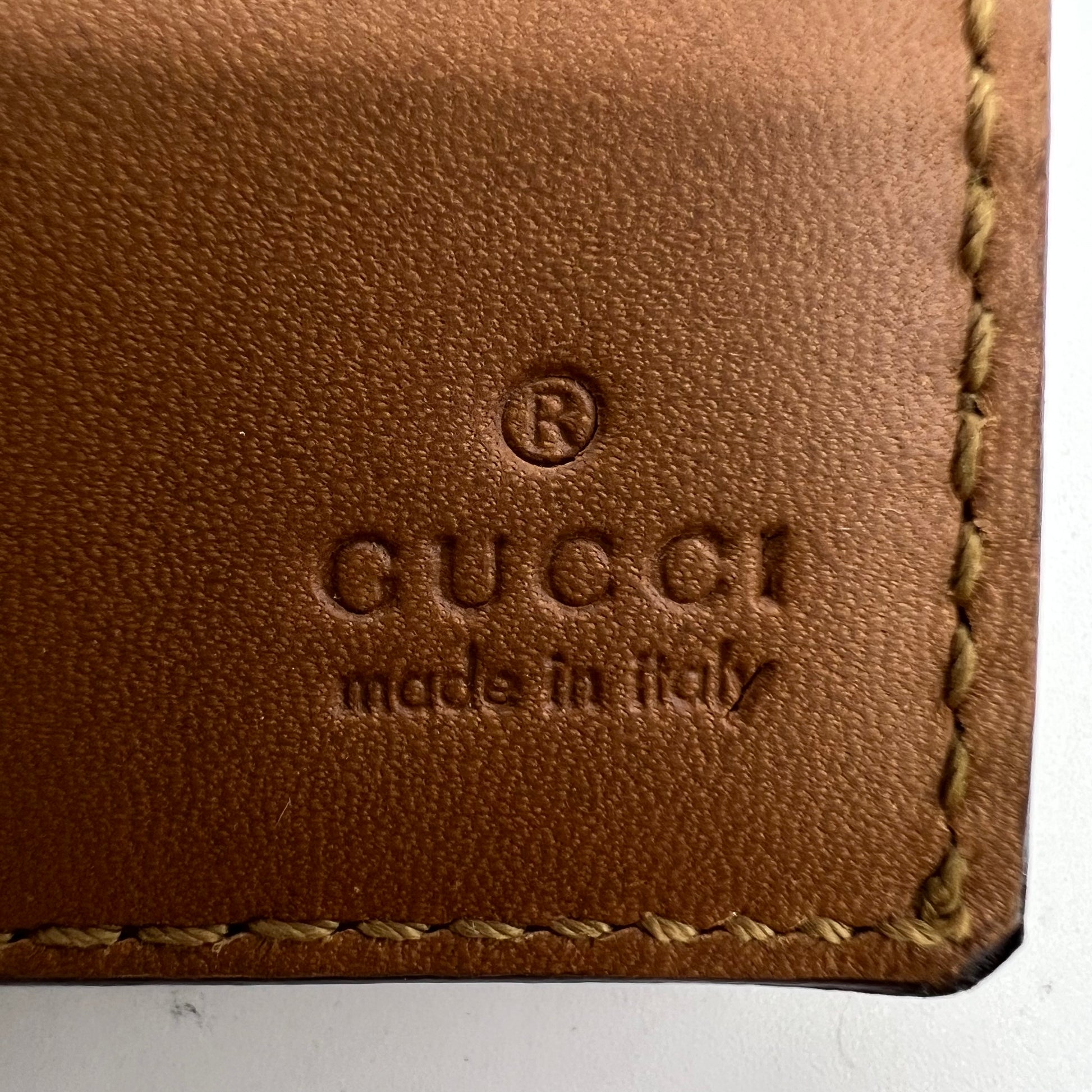 Gucci Selleria Embossed Smooth Leather Bi-Fold Wallet W22559