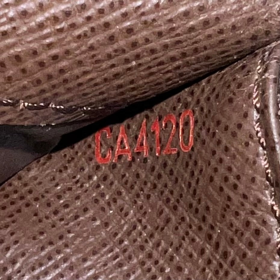 Louis Vuitton Zippy Wallet in Damier Ébène Canvas W22535